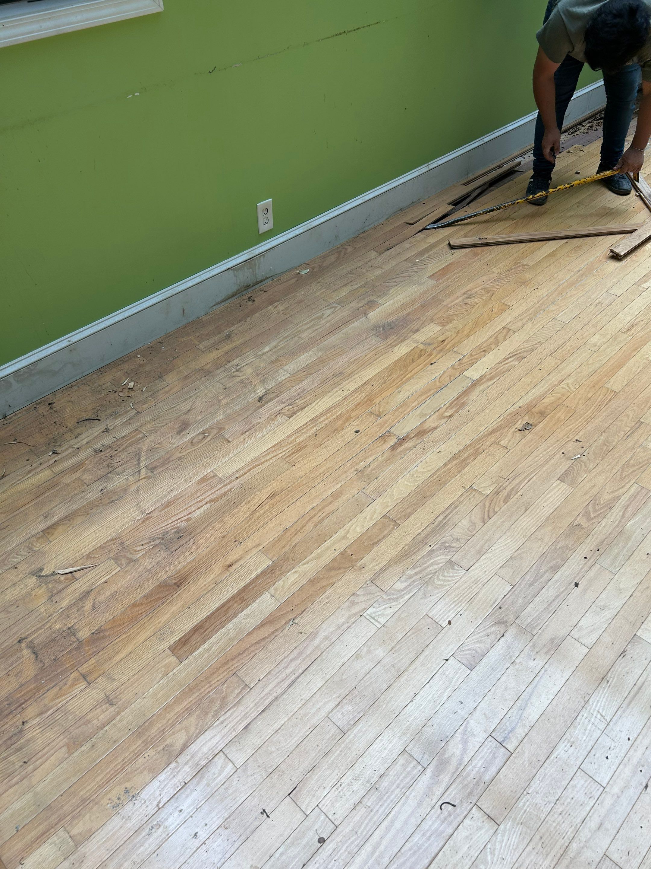 Water-damaged hardwood by Footprints Floors of Nashville