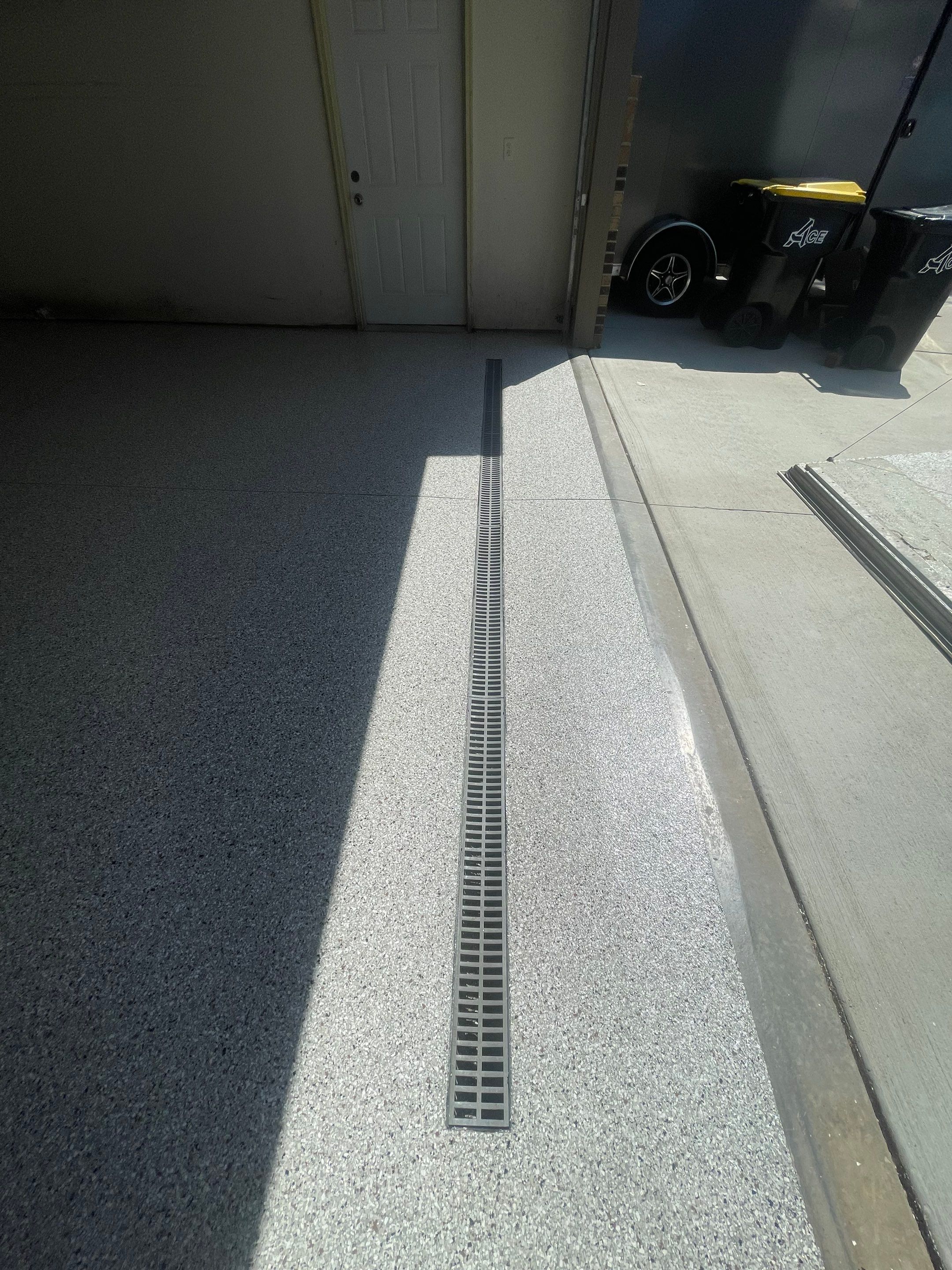 Multi-Stall Garage Floor Coating Installation in Sioux Falls by Select Painting, Coatings & Garage Cabinets