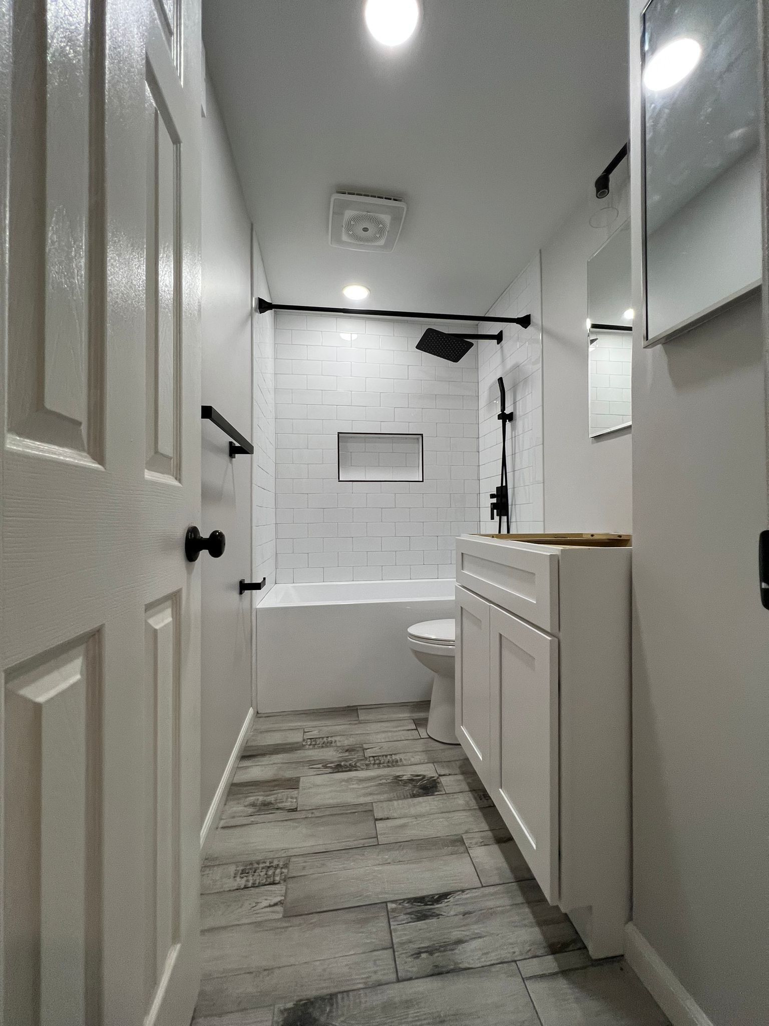 Bathroom Remodel using Cabinets by Home Concepts Construction