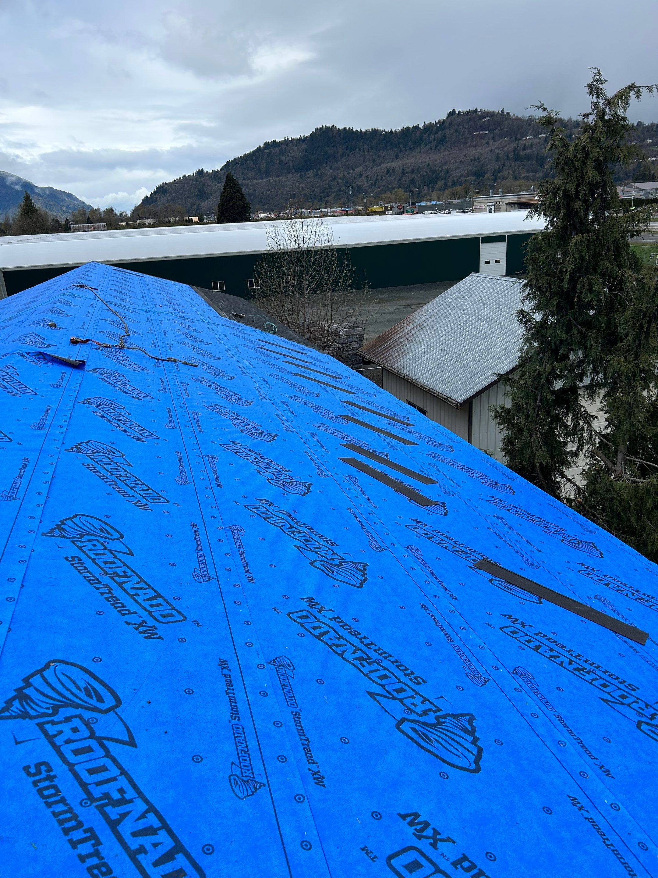 Residential Roofing Installation using IKO Dual Black Biltmore by Top Notch Roofing Inc