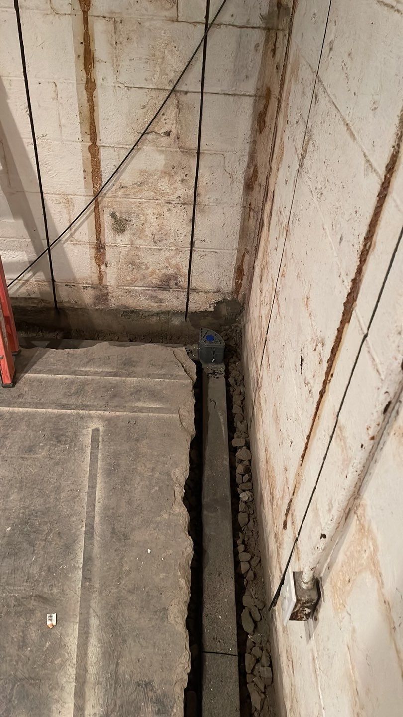 Embedded Fiber Reinforcement and Basement Waterproofing using GrateDrain Waterproofing System by Toledo Basement Repair