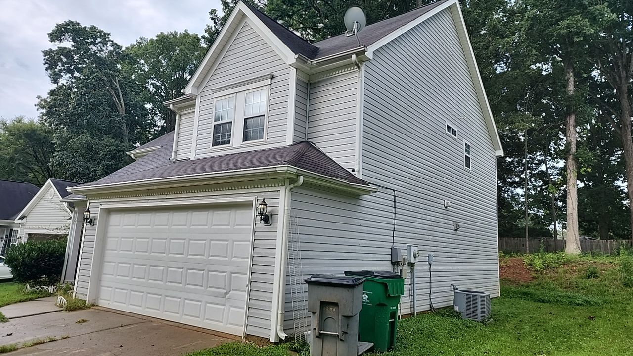 House Wash using cleaner by Power Wash Masters LLC