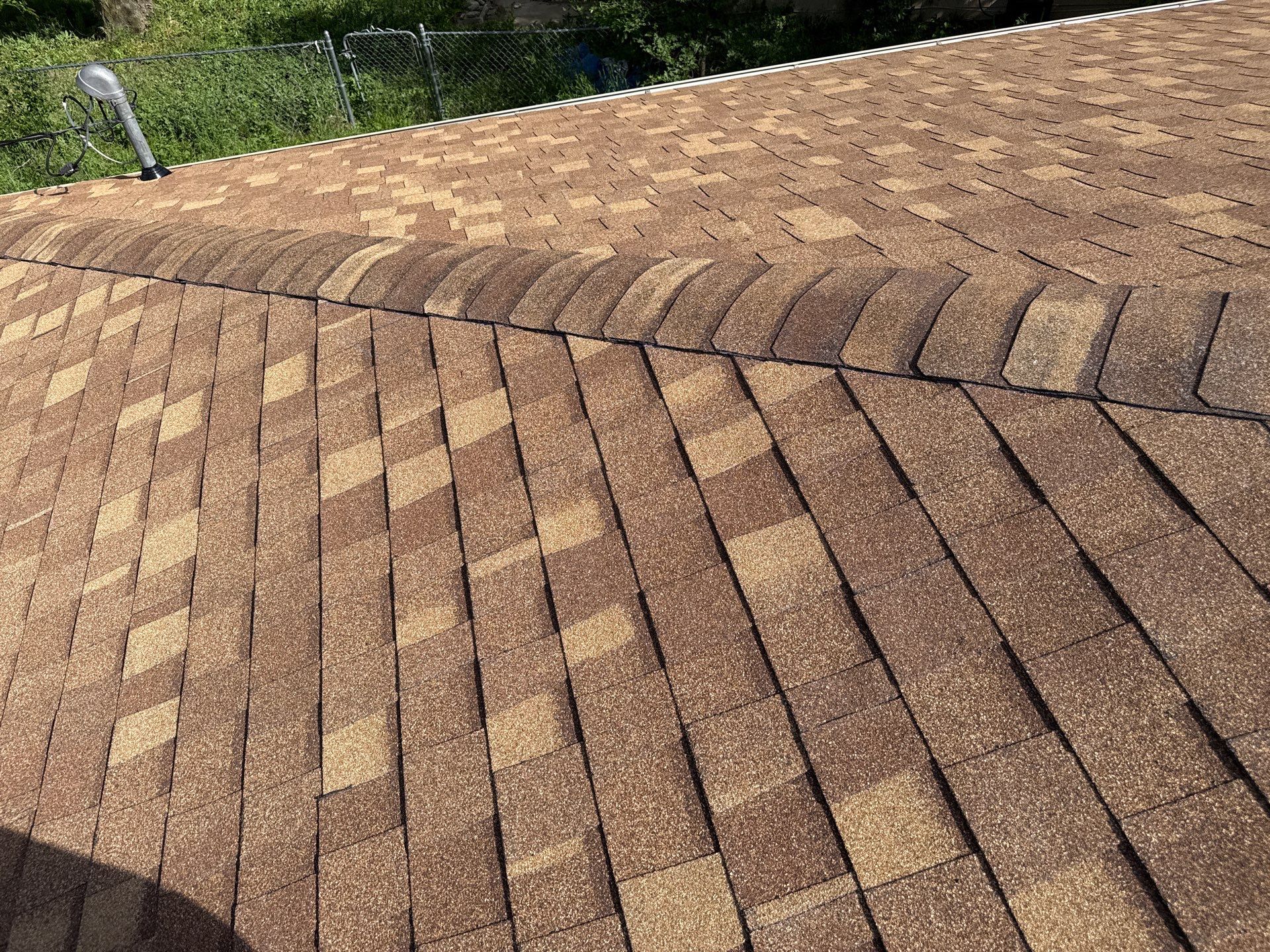 Storm-Damaged Roof & Gutter Replacement by Eaton Roofing 