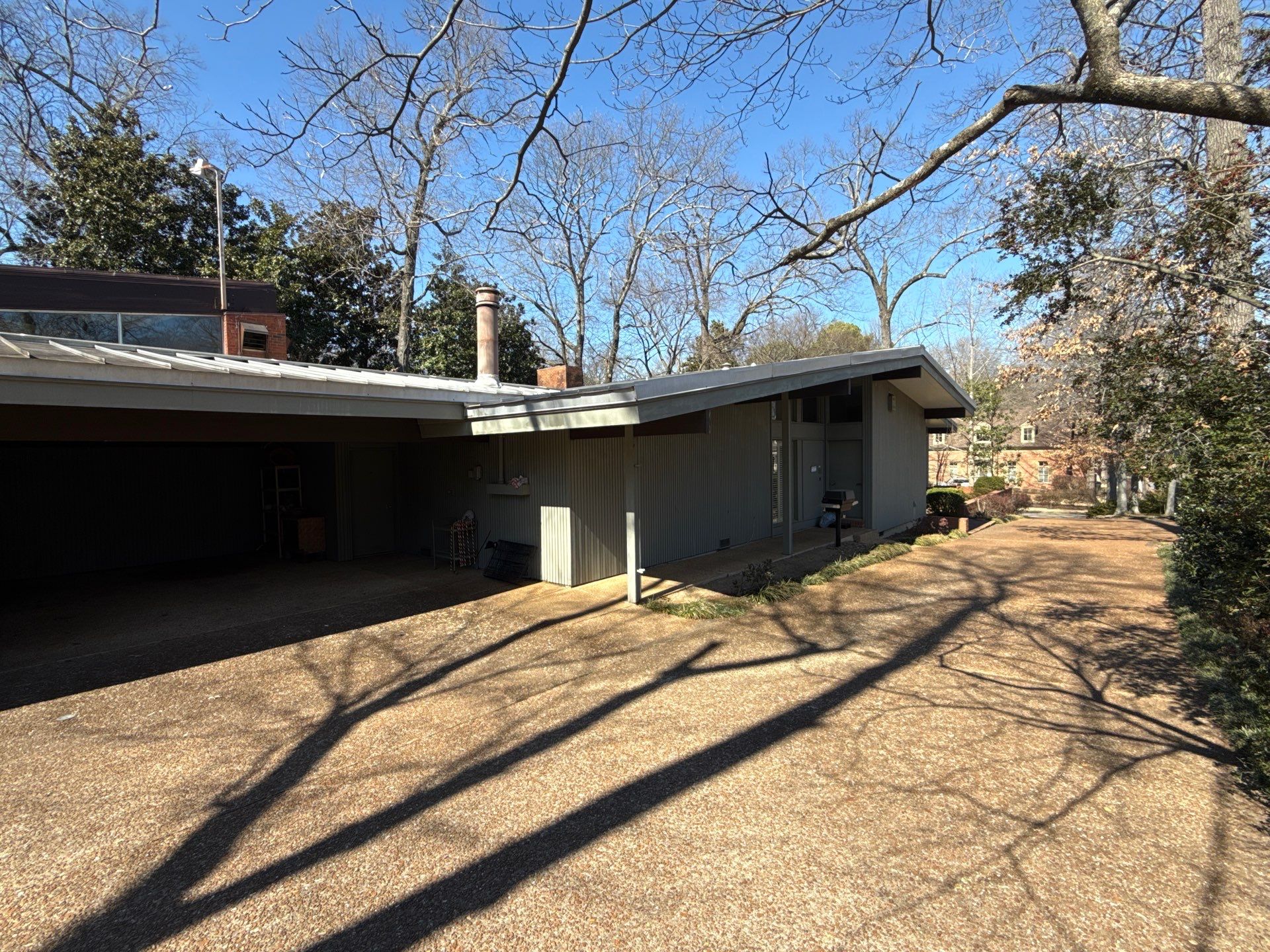 Residential Standing Seam Metal Roof and Membrane Replacement in Memphis by Revival Roofing Services