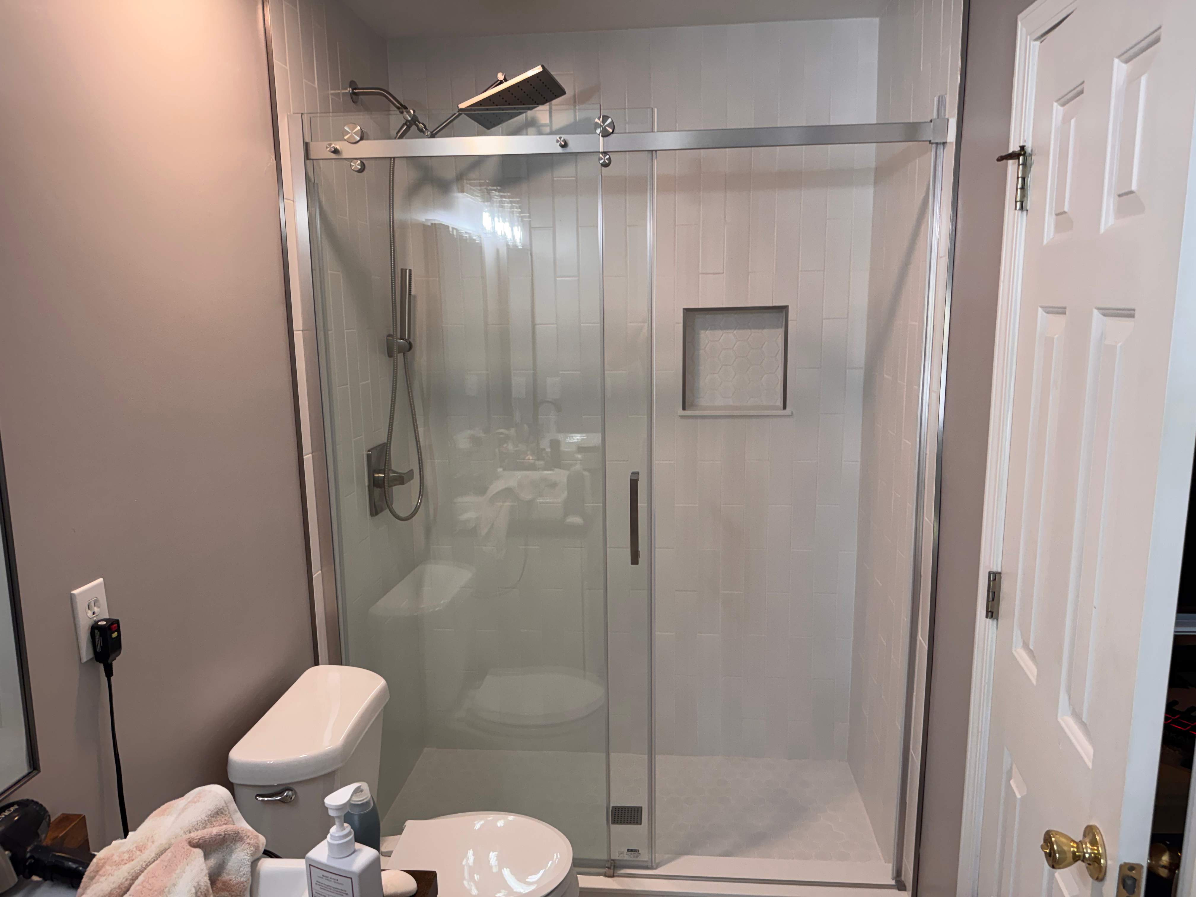 Tub to walk-in shower conversion by Prudencio