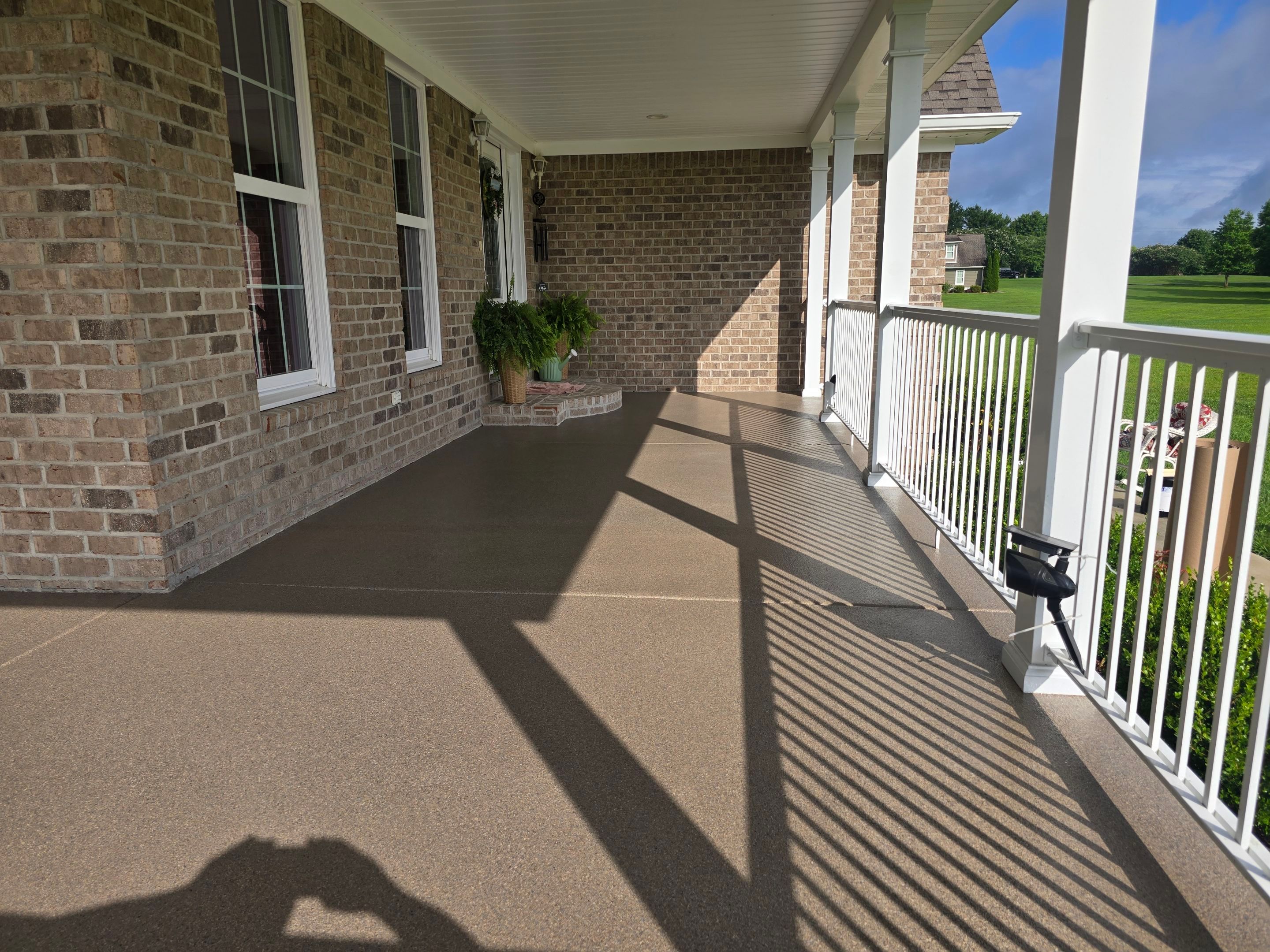 Porch & Garage Using Obsidian by Elite Floor Solutions