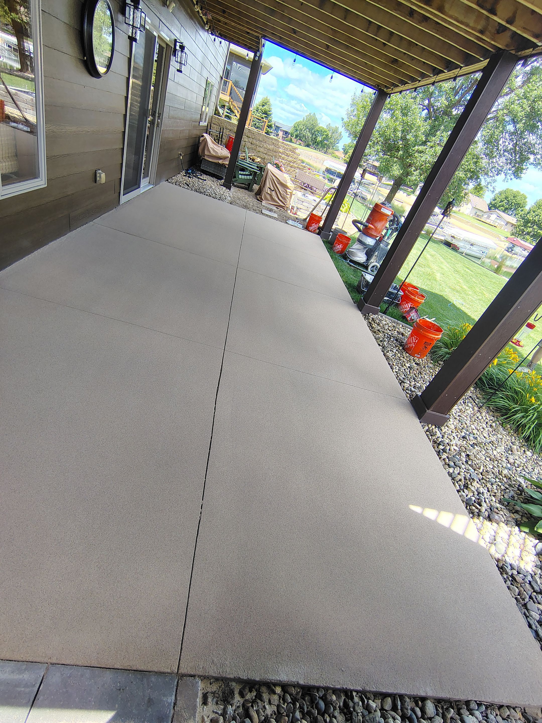 Textured Concrete Coating and Entryway Restoration in Madison by Select Painting, Coatings & Garage Cabinets