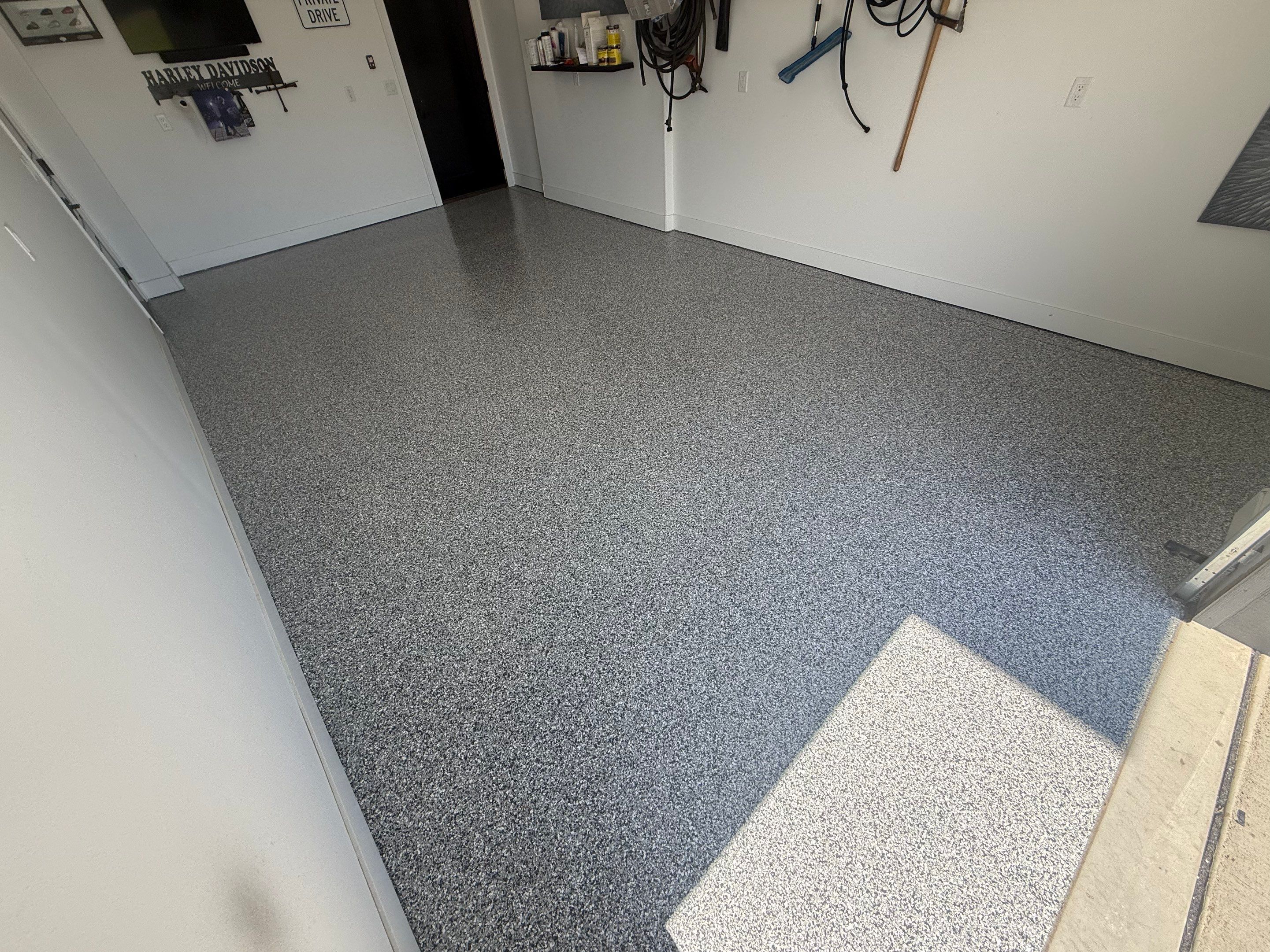 Gravel Flake Garage Floor Coating in Yankton by Select Painting, Coatings & Garage Cabinets