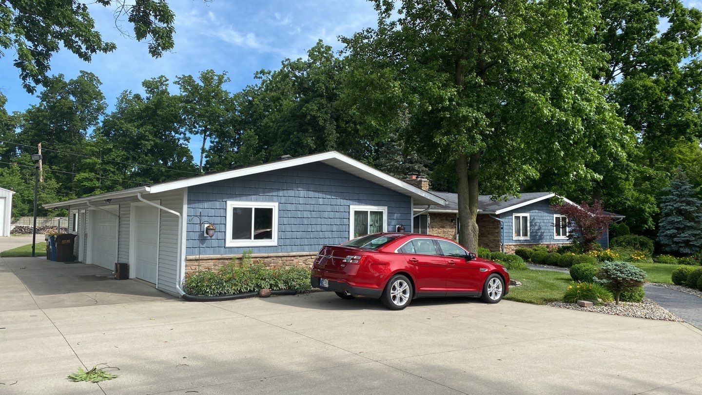 Residential Roofing Installation using Exposed Fastener Metal Roof by 4Ever Metal Roofing