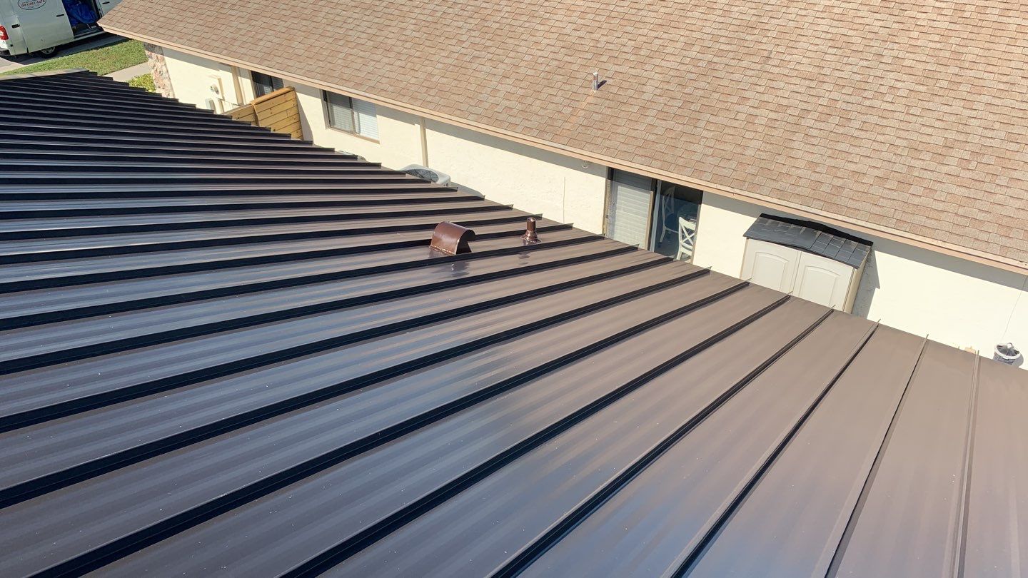 Residential Roofing Installation using 1" Nail strip metal roof by BLUES BROTHERS ROOFING