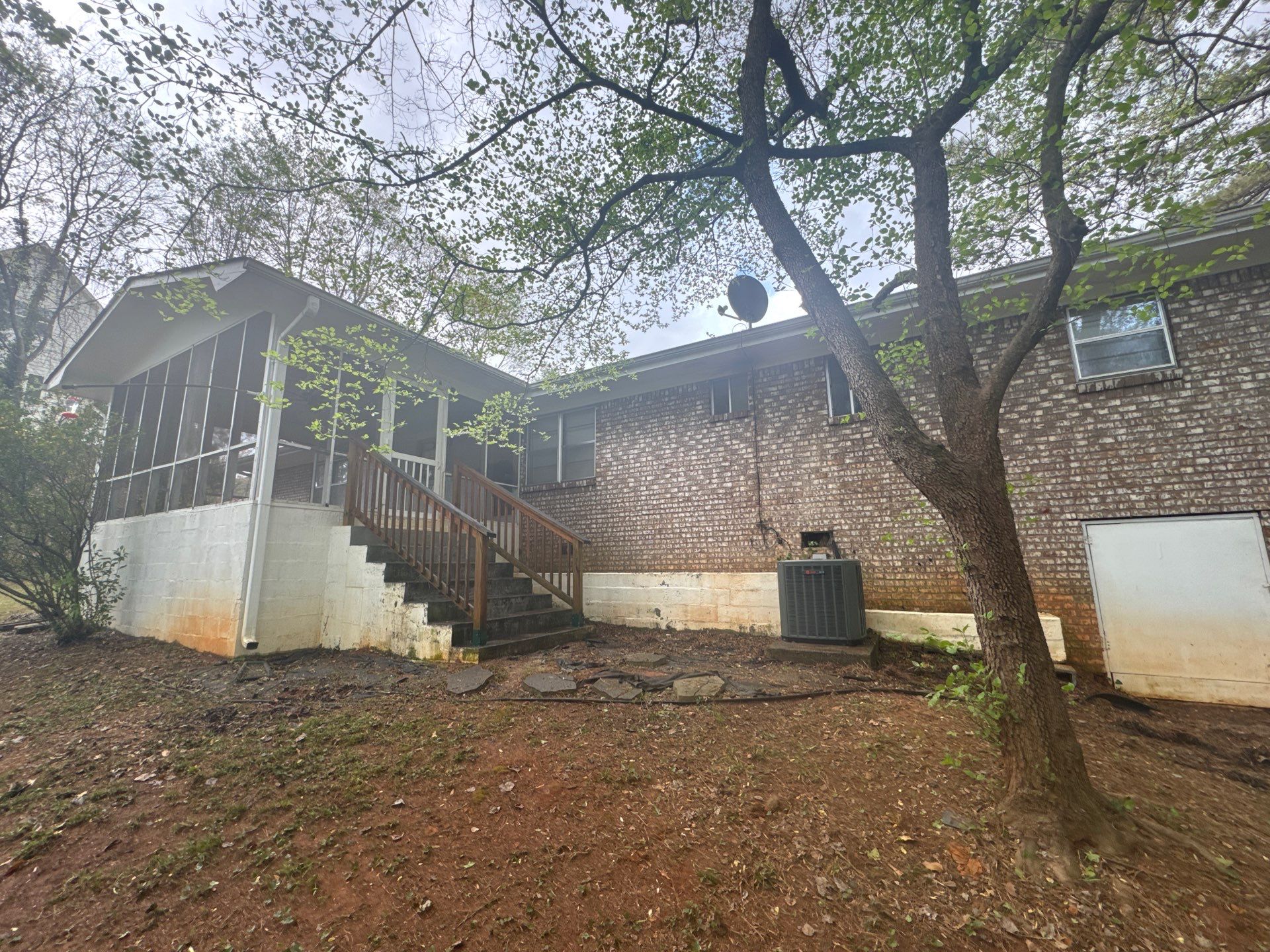 White Brick Exterior Painting and Shutter Refresh in Marietta by Swift Home Renovations