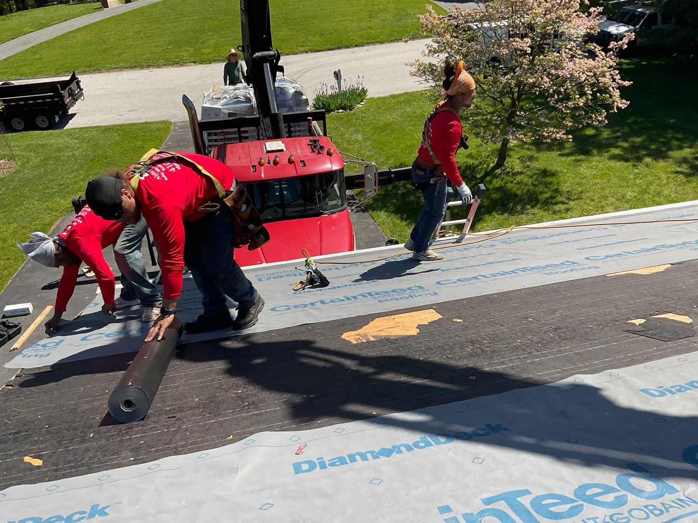 Residential Roofing Installation using Landmark Shingles Color Weatherwood by Alpha Design Services