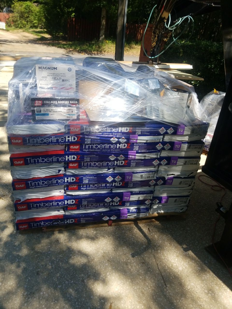 Residential Roofing Installation using Roof Replacement by American Roofing & Construction LLC