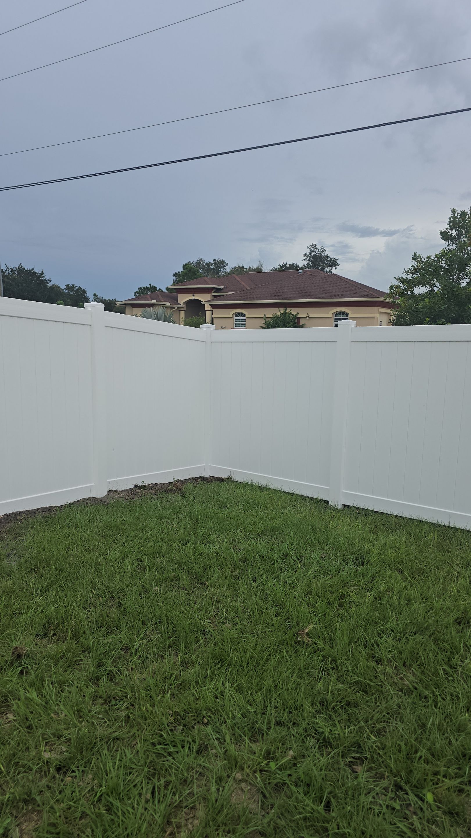 White Vinyl Privacy Fence Installation for North Port Residence by True Fence LLC