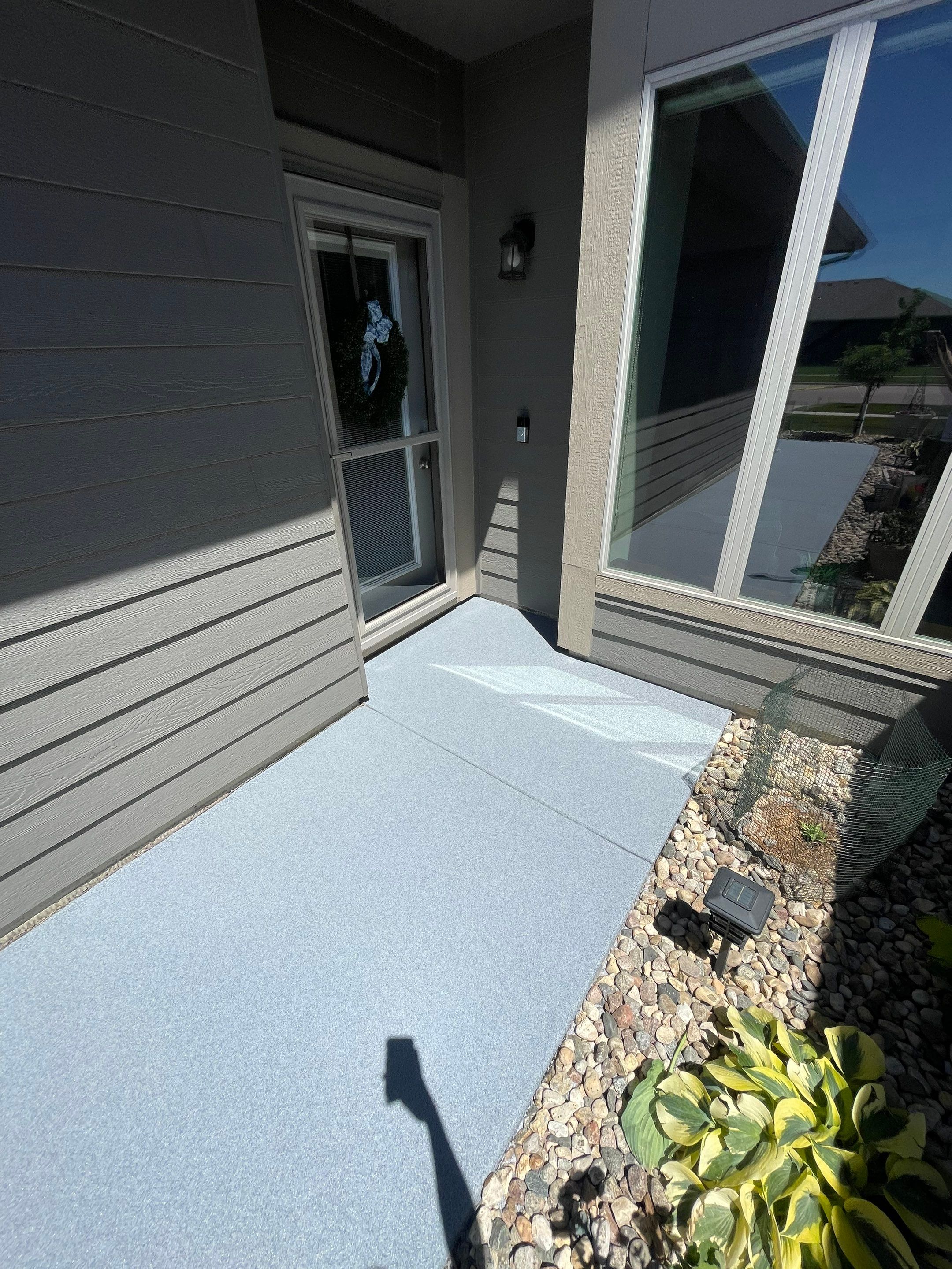 Custom Concrete Coating for Sioux Falls Patio and Front Walkway by Select Painting, Coatings & Garage Cabinets