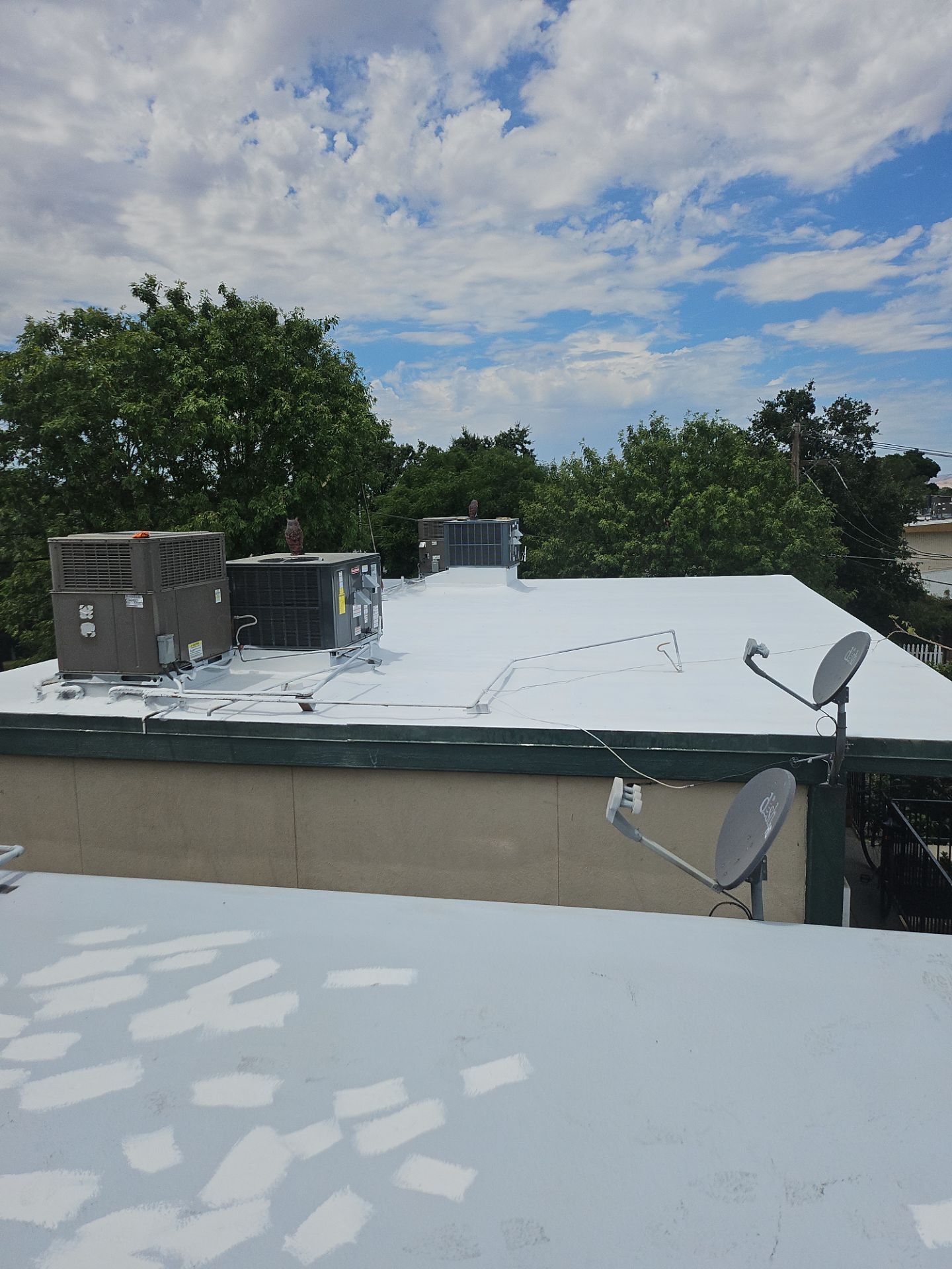 Foam Refurbish using General Coatings acrylic coatings and spray foam by Straight Edge Roofing Inc