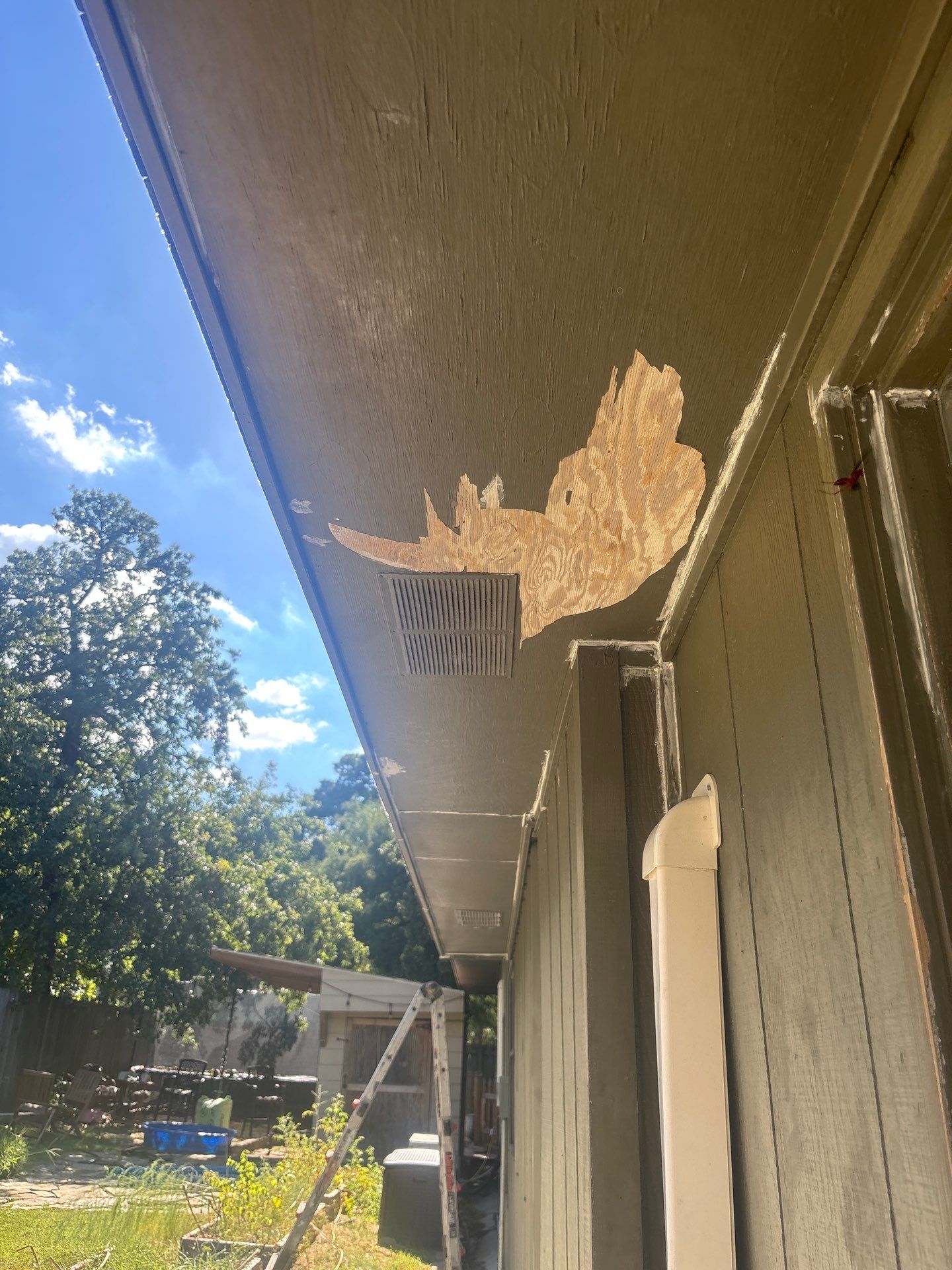 Exterior Painting in Flint, TX | White Brick Home & Metal Building with Sherwin-Williams Duration by Quality Coats Painting