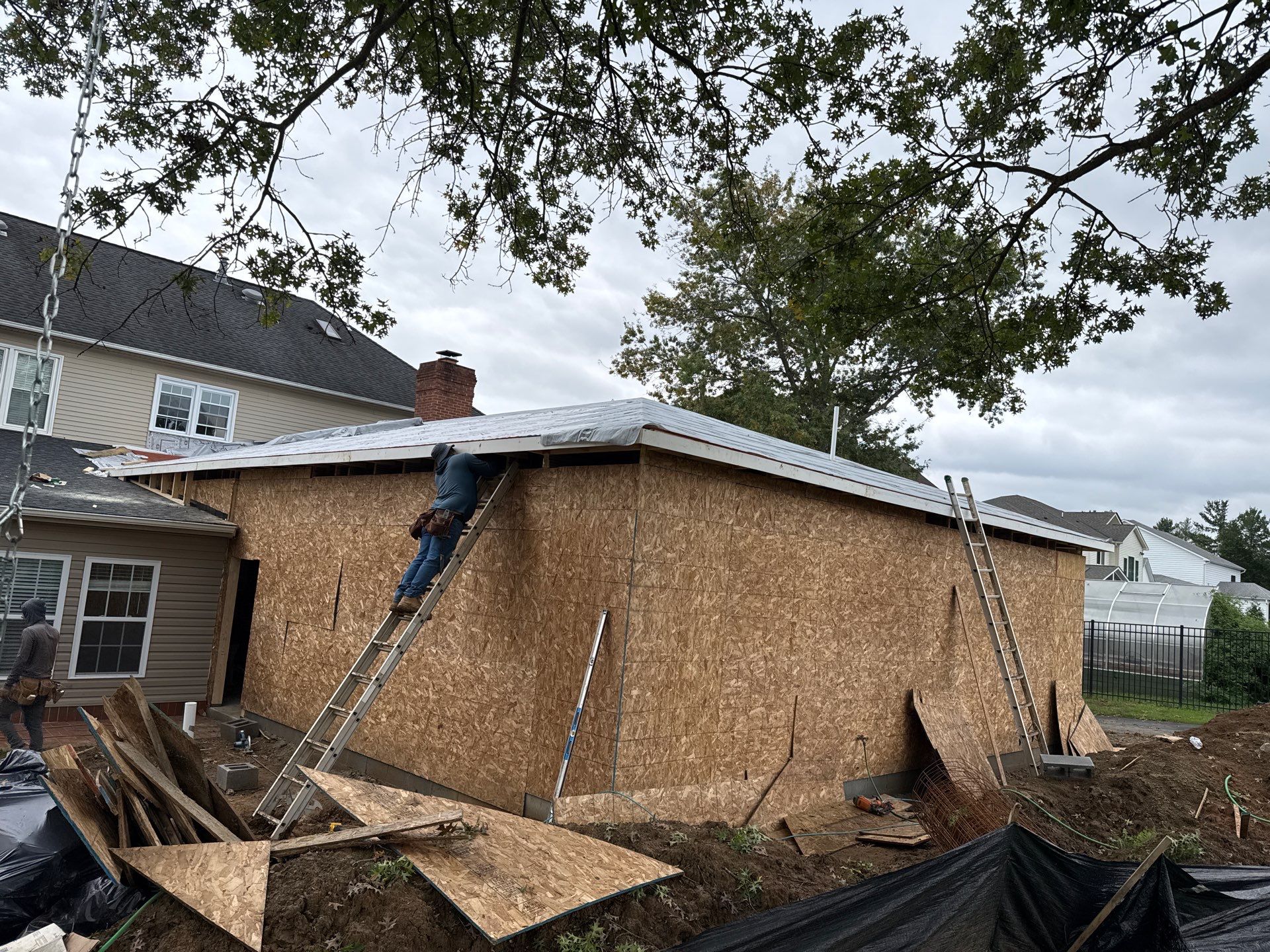 Home addition  with a bedroom ,kitchen , family room  by Jesus Master Handyman LLC 