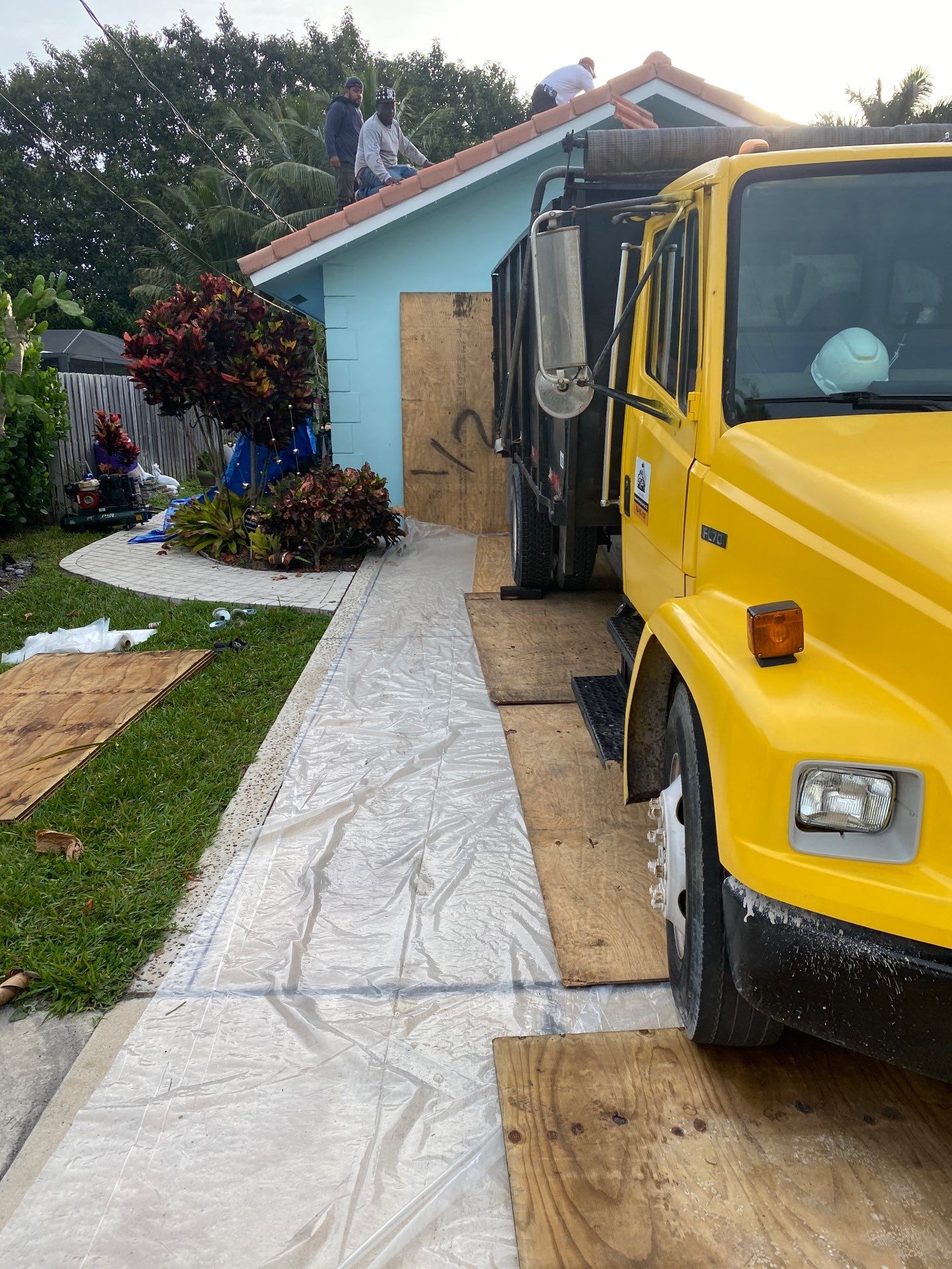 Residential Roofing Installation using 1" Nail strip metal roof by BLUES BROTHERS CONSTRUCTION CORP
