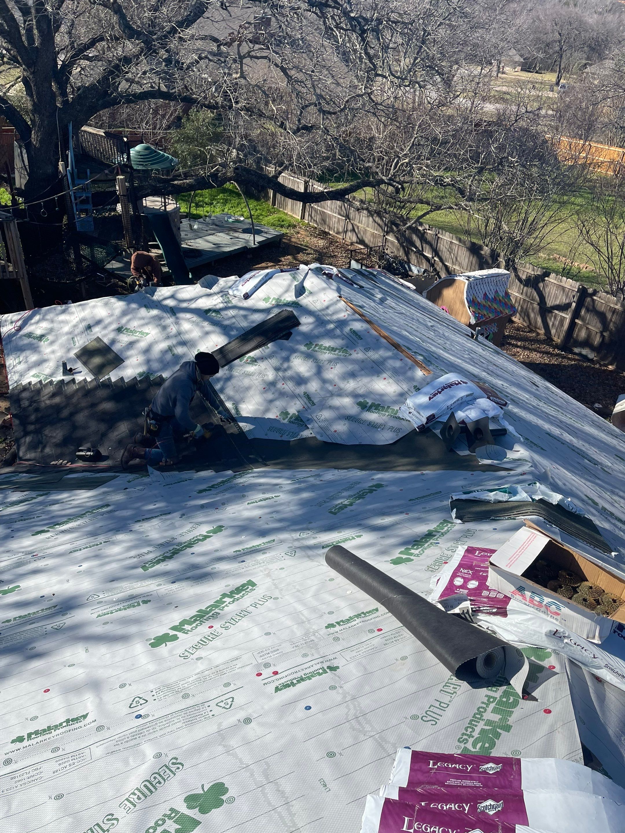 Residential Roofing Installation using Malarkey Legacy Scotchgard Shingles by Harvey Roofing & Construction