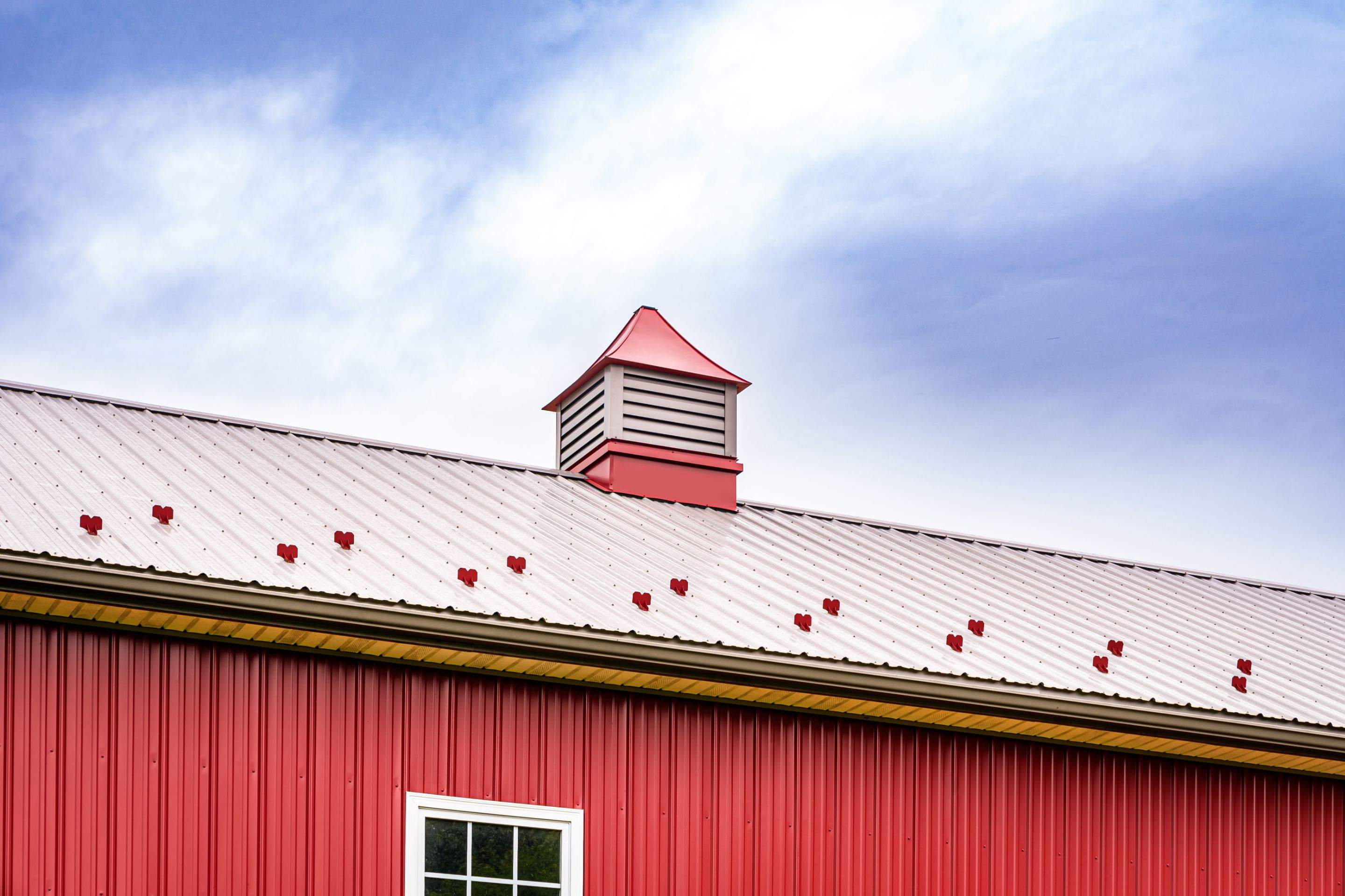 Metal roof -barn red, and New garage by Esh Builders