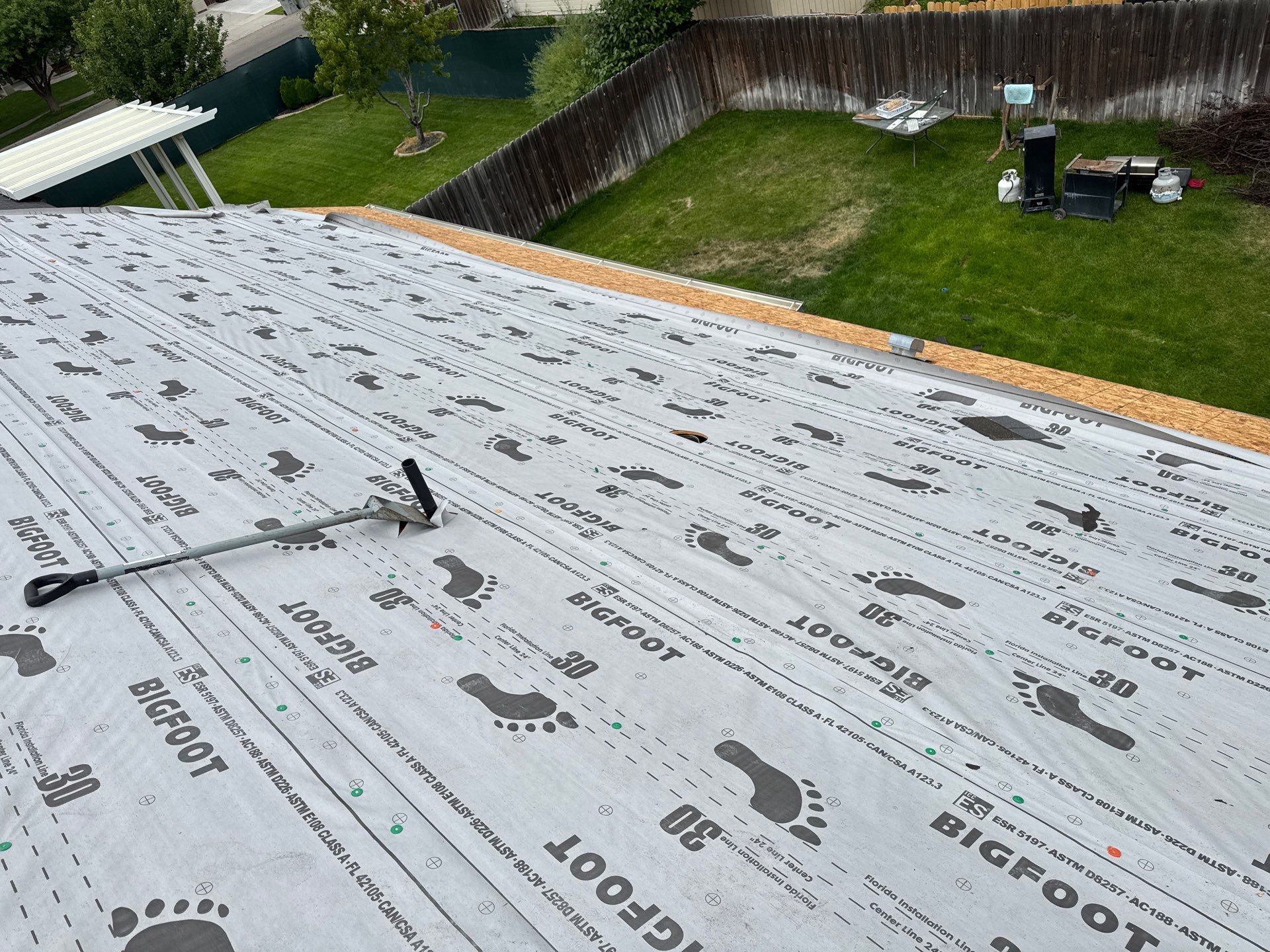 Residential Roof Replacement Featuring Charcoal Grey Architectural Shingles by Olive Roofing