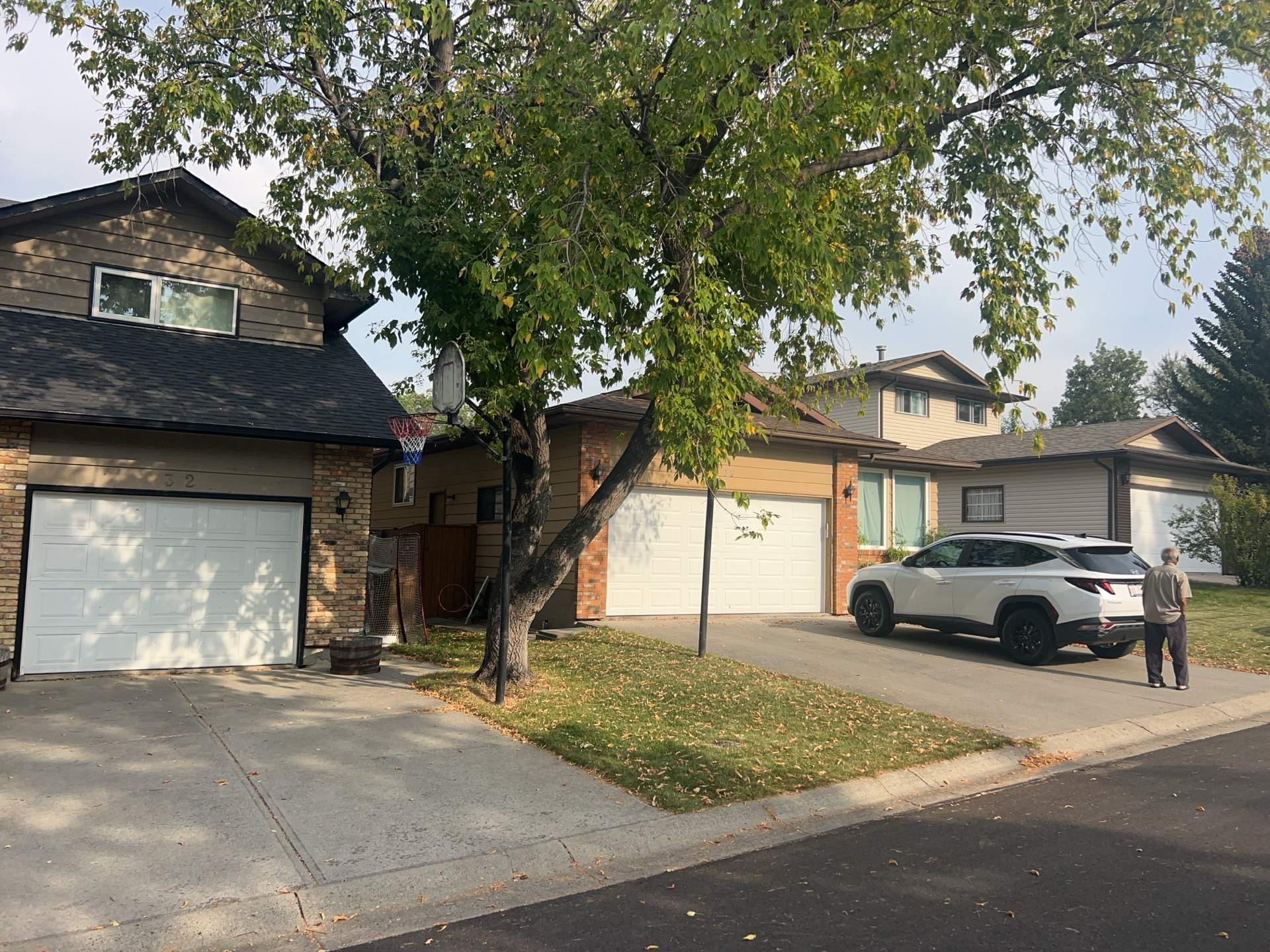 Calgary Chimney Chase Reconstruction and Exterior Siding Replacement by Smart Home Building Systems Ltd.