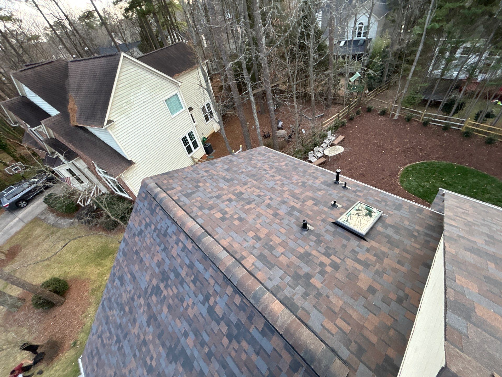 Owens Corning Duration Shingle Roof Replacement and Velux Skylight Installation in Charlotte by Merritt Roofing LLC