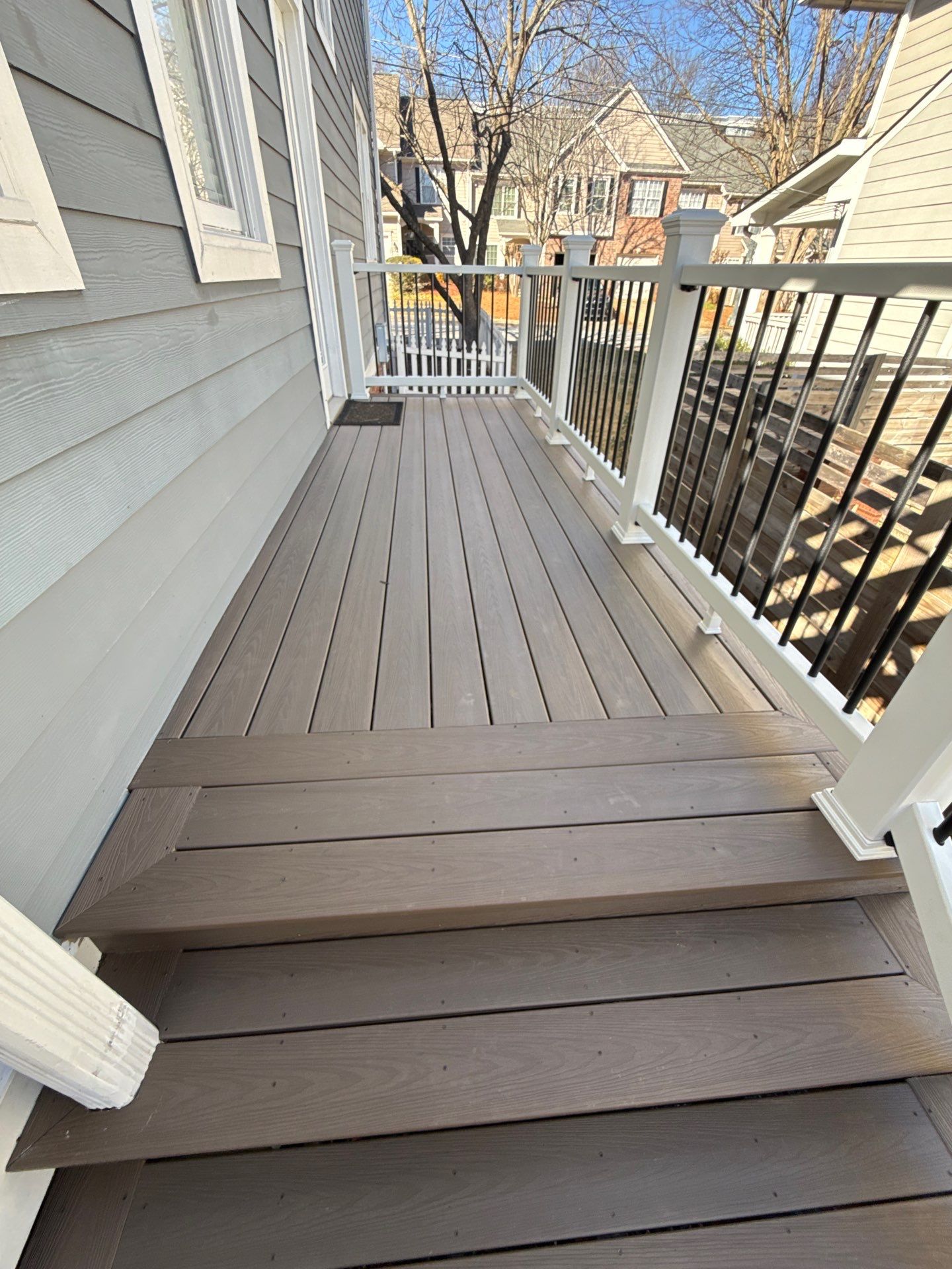 Atlanta, GA Deck Rebuild and Pergola Build using Deckorators Venture Series Decking, Trex Composite Railing, and Pressure Treated Pine by Nelson Exteriors 