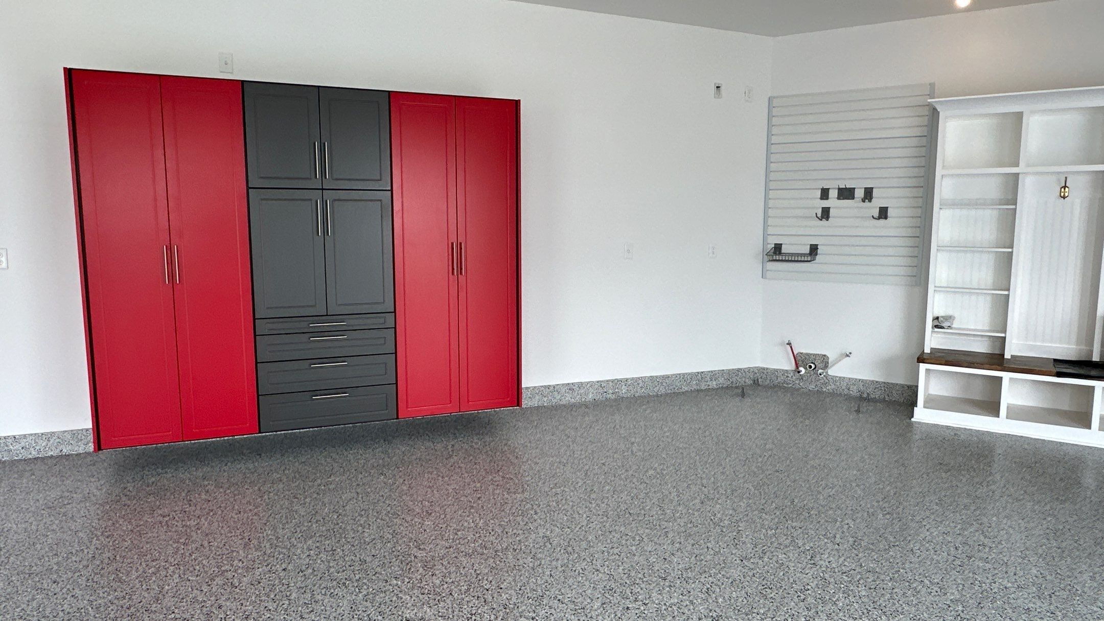 Louis P. transformed their garage into the garage of their dreams by Banner Garage