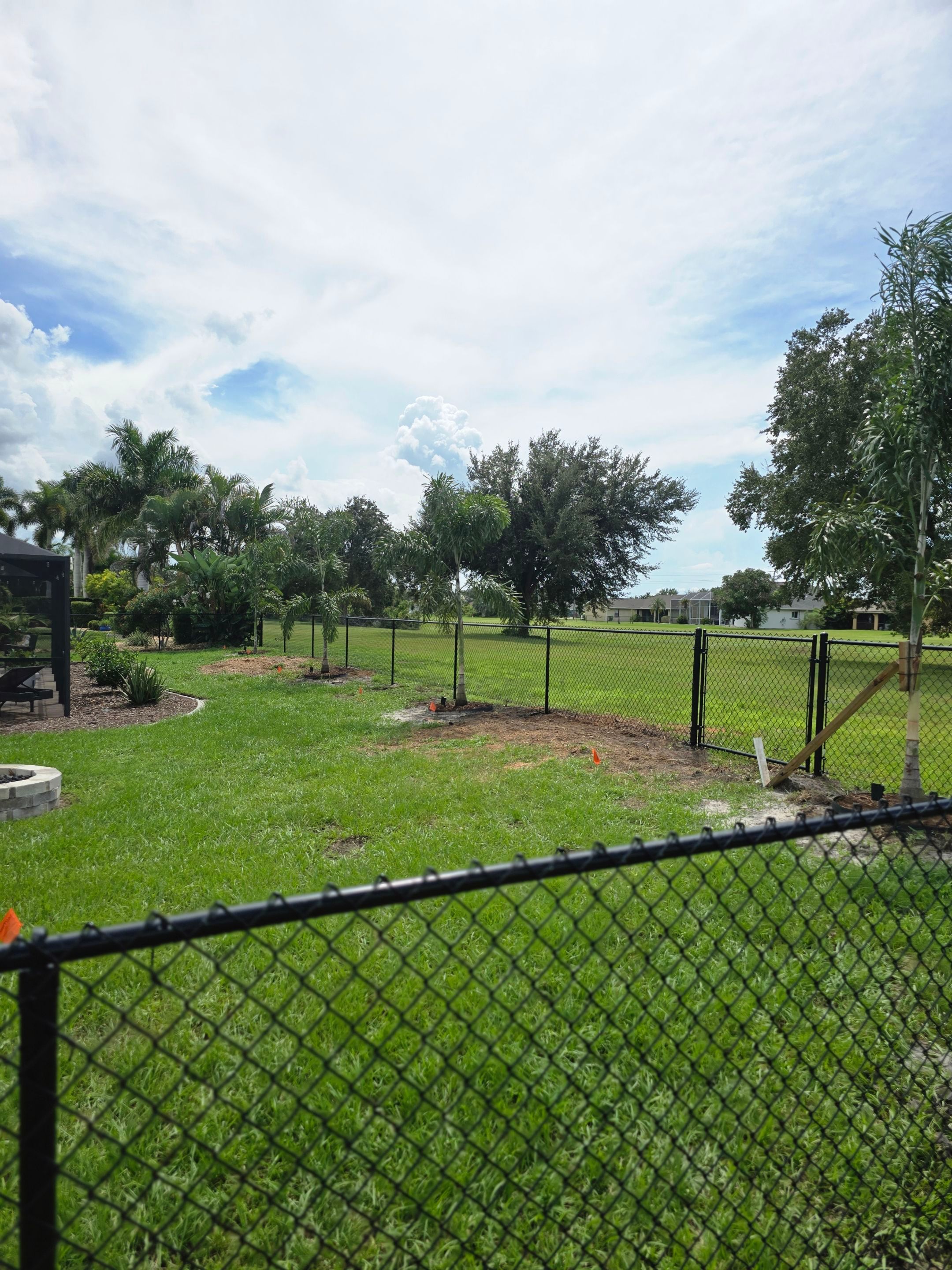 Black Vinyl-Coated Chain Link Fence Installation in Punta Gorda by True Fence LLC