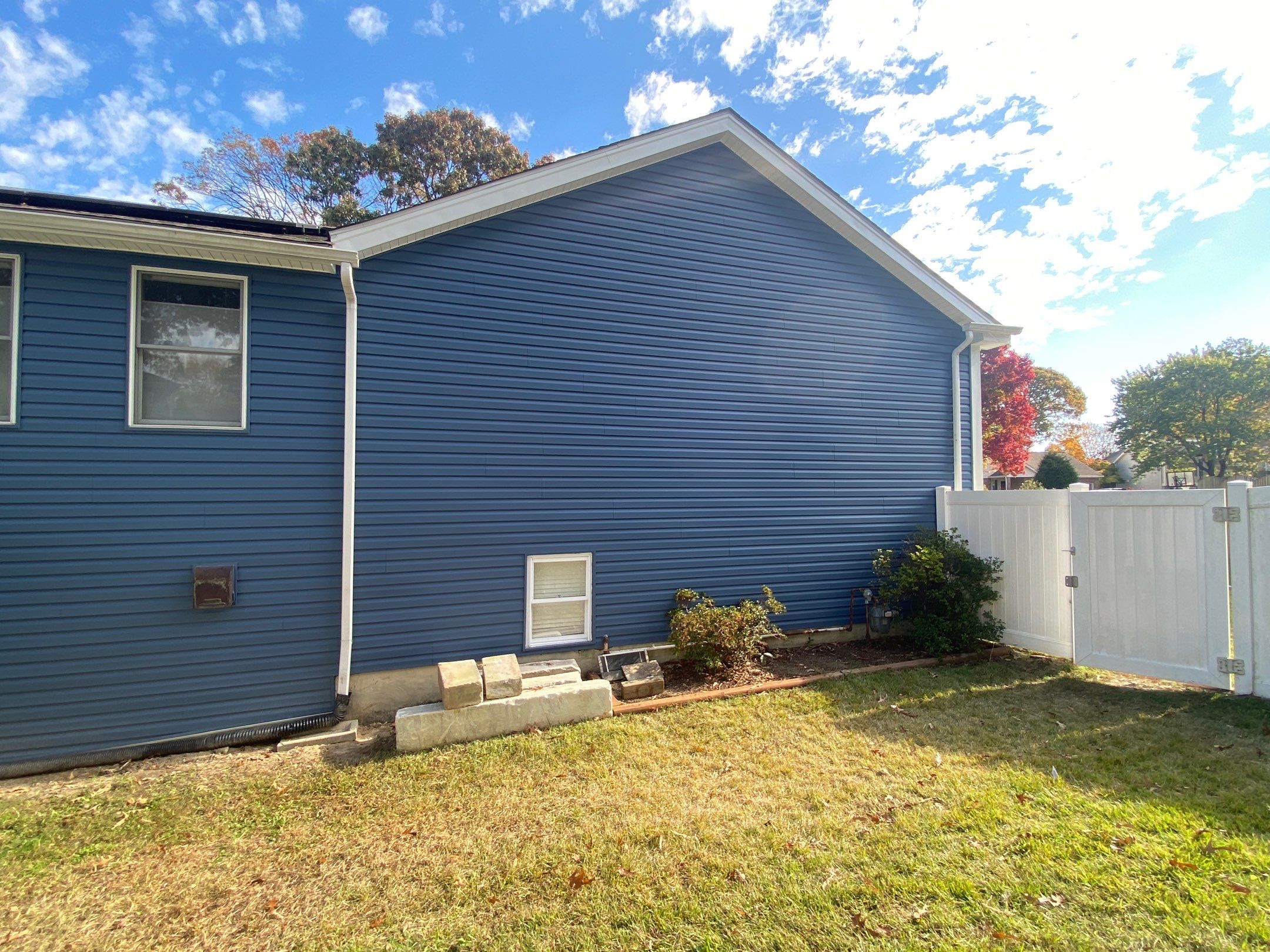 MASTIC Siding + Gutter Update by American Home Contractors