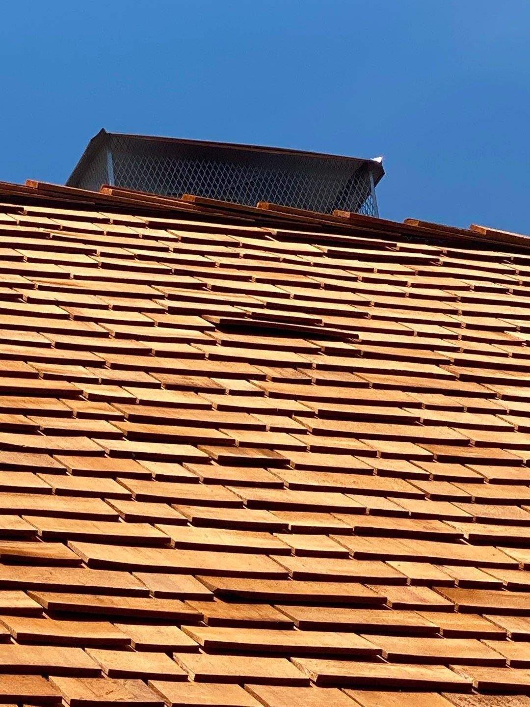Cedar Shake Roof Replacement with Half Round Gutter Installation by Custom Installations