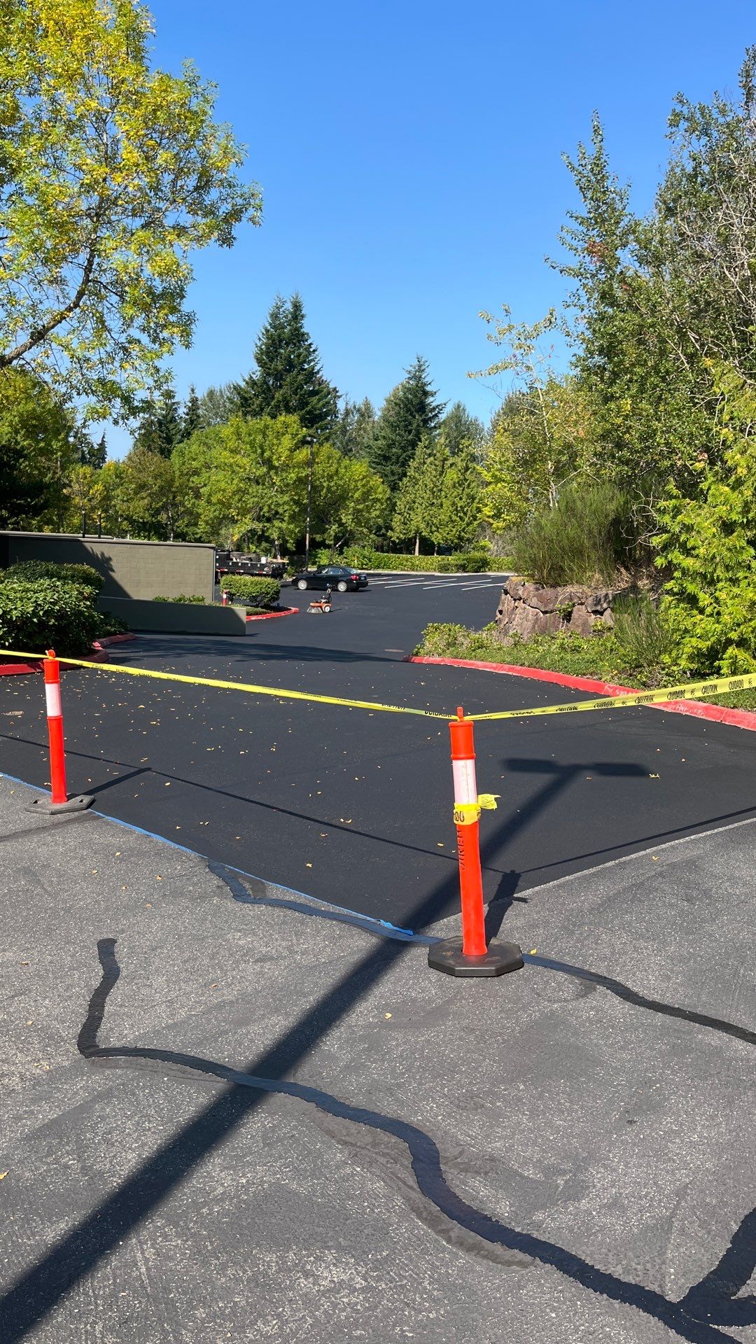 Kidder Matthews | Parking Lot Sealcoating & Striping with Concrete Curb & Patch Repairs  by Jireh Asphalt & Concrete Inc 