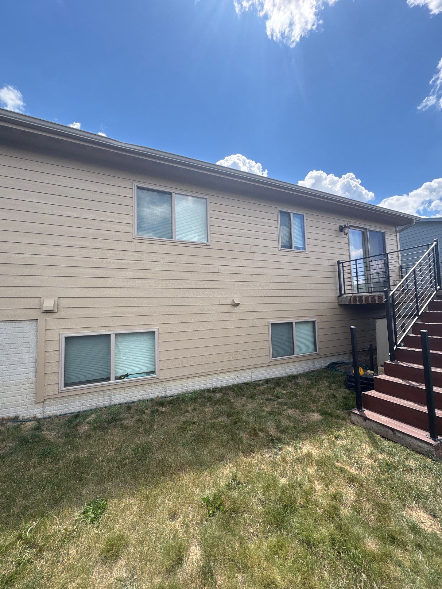 Exterior Painting and Custom Deck Construction in Sioux Falls by Select Painting, Coatings & Garage Cabinets