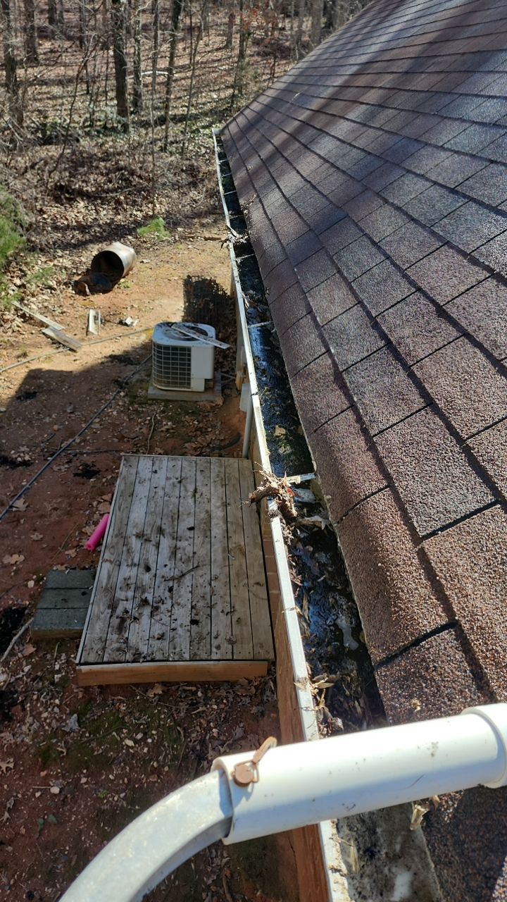 Gutter and Roof cleaning using cleaner by G&H Home Tech Pros LLC