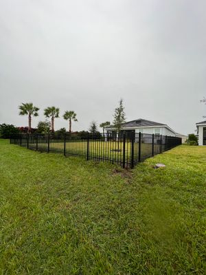 Aluminum Fence Installation using Black 3 Rail Aluminum Fence