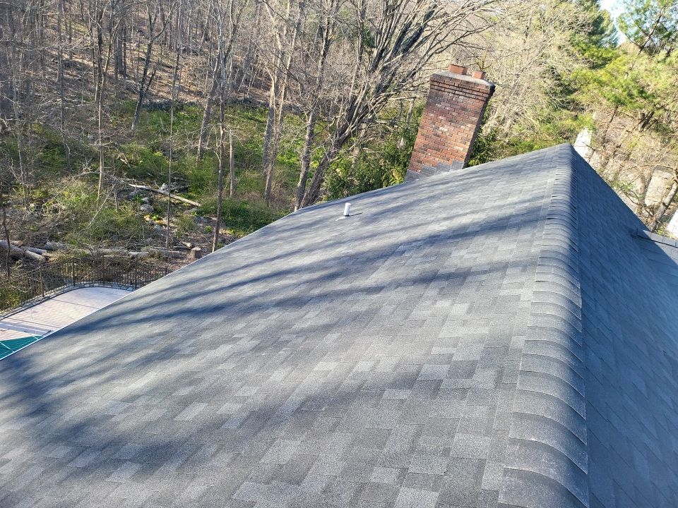 Residential Roofing Installation using onyx black by A Plus Exterior