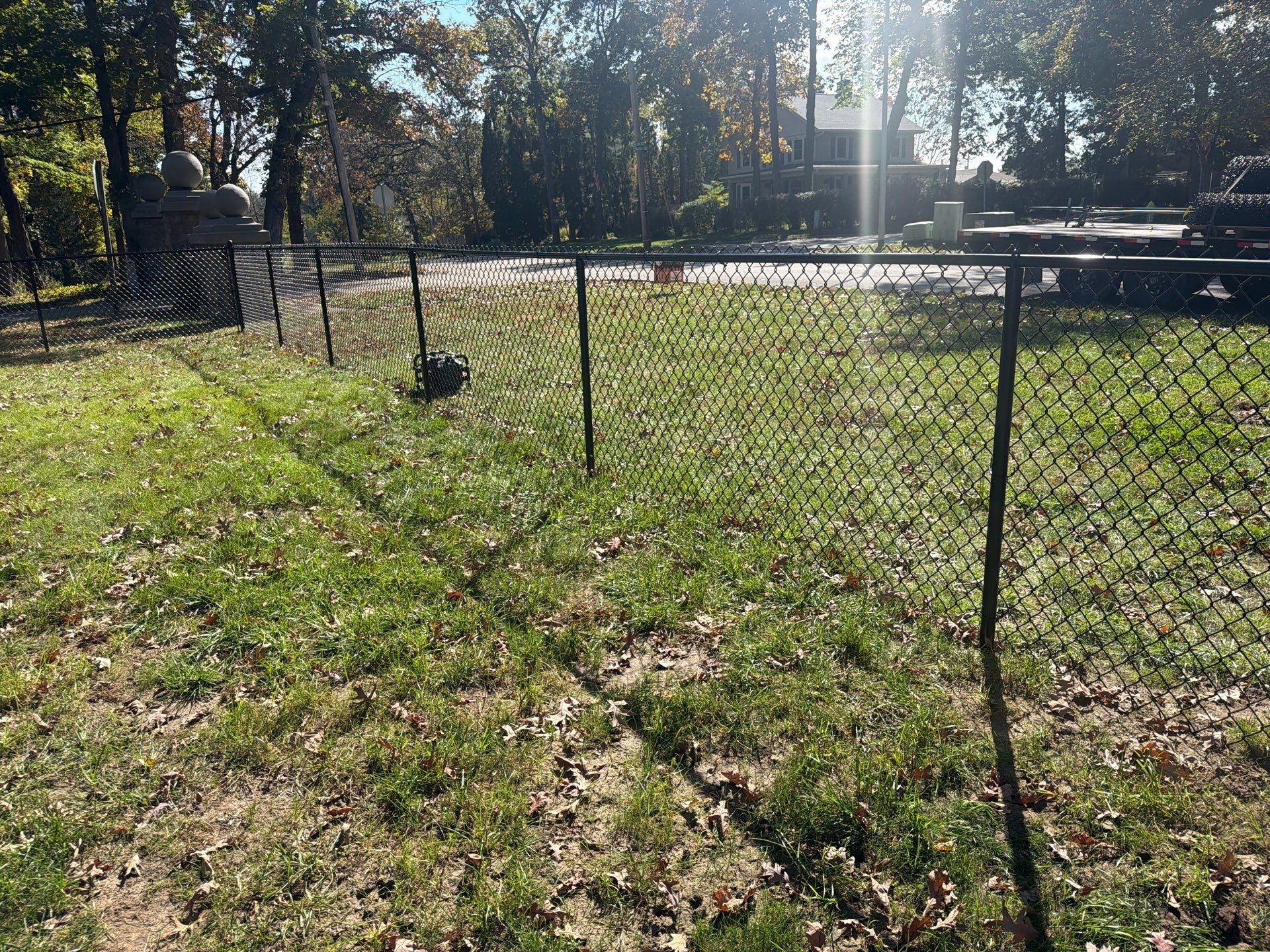 Residential Black Chain Link Fencing in Cedar Falls by Perfect Picket Fence and Stain