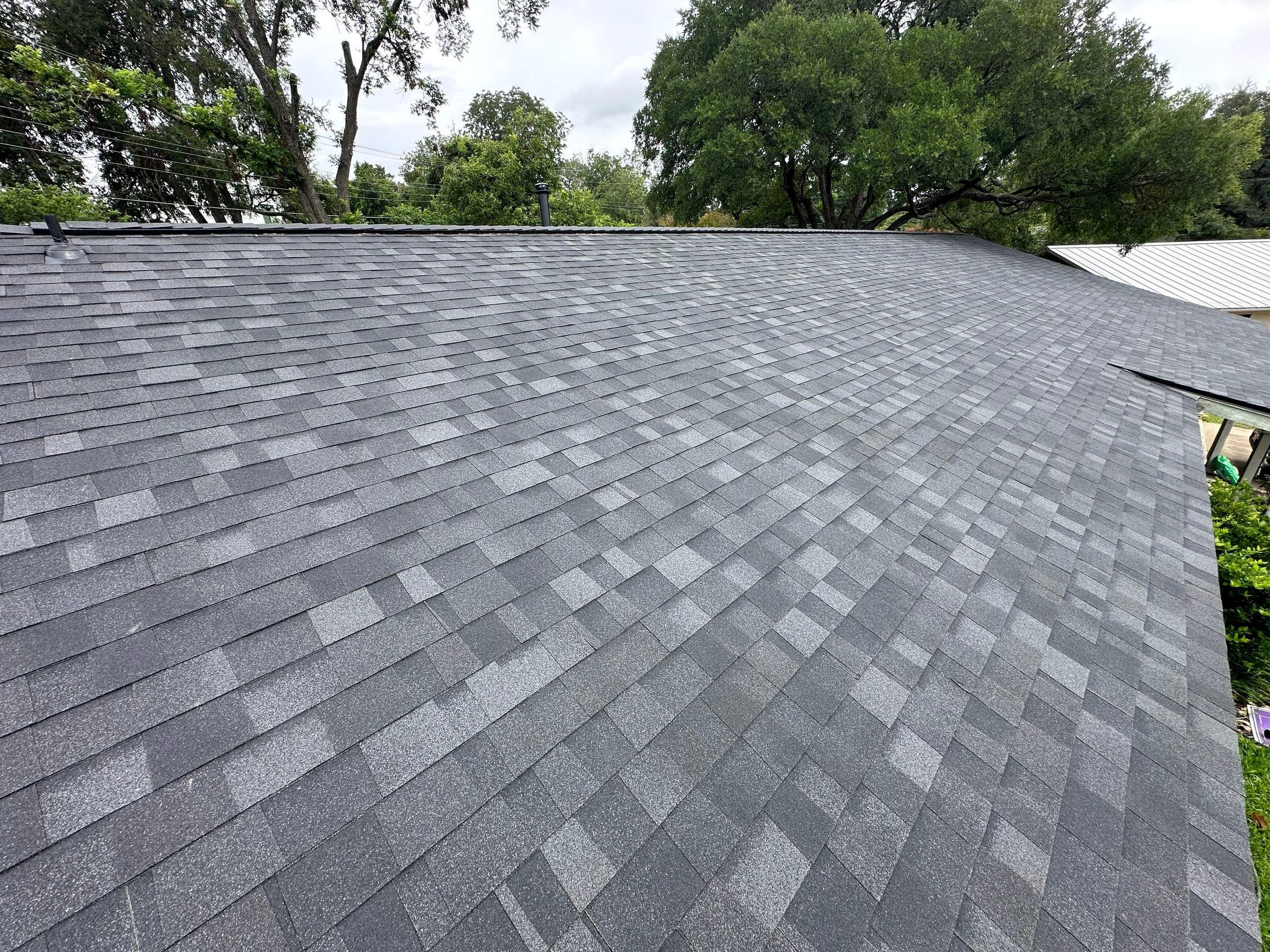 Onyx Black Oakridge Roofing Around Austin Skylights by Skywall Construction LLC