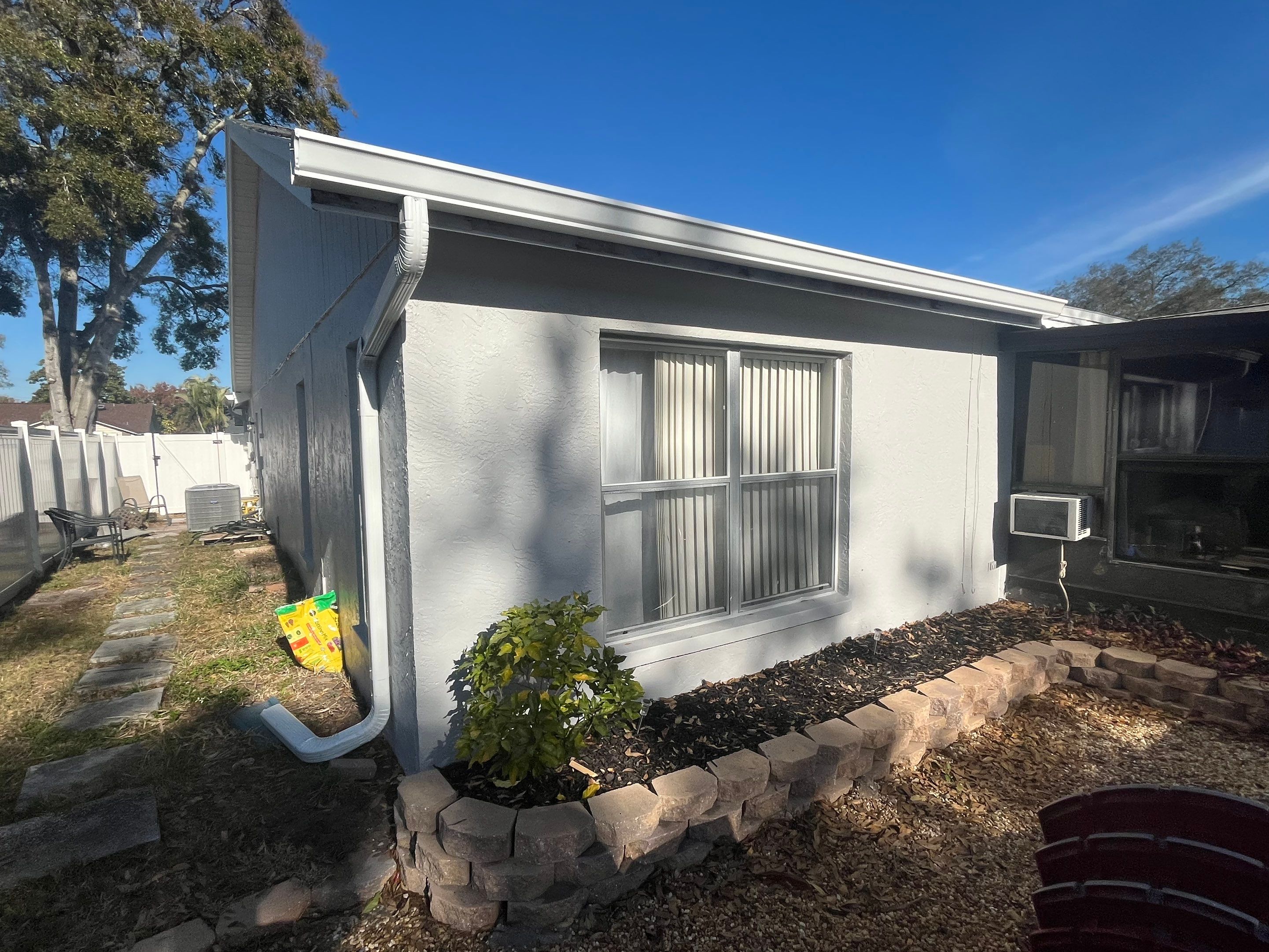 White K Style Seamless Gutters using Aluminum Seamless gutters Downspout Extension Palm Harbor FL by Gutter Professors