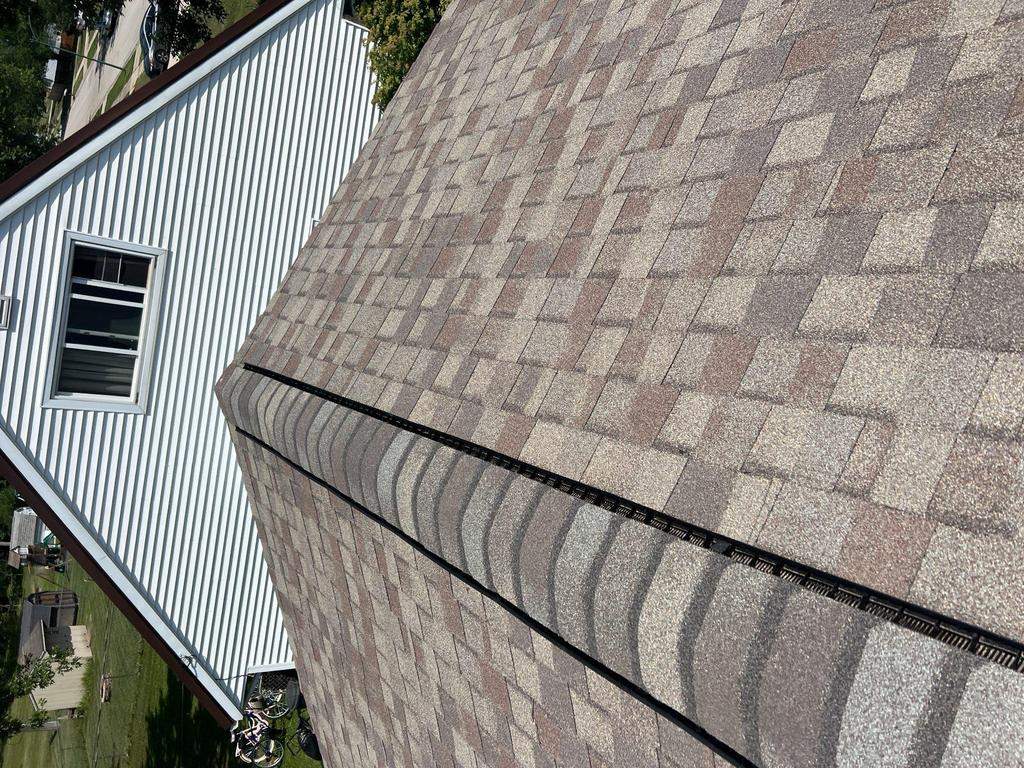 Residential Roofing Repair using Ridge vent replacement by Nitro Roofing and Construction