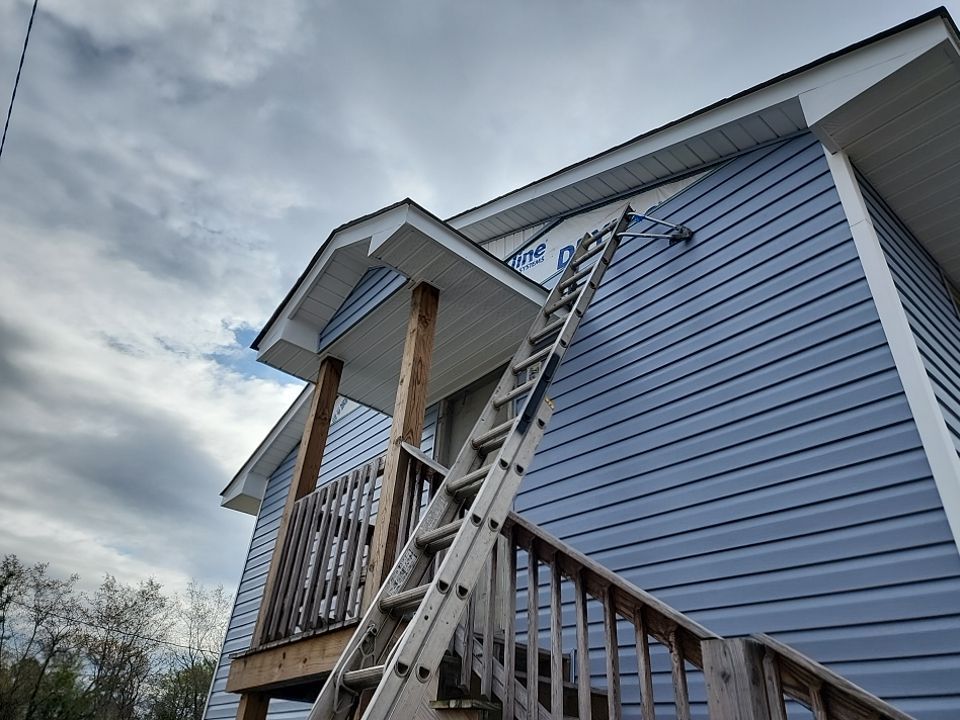 Interior and exterior renovation using Royal Building Products  by Indigo State Roofing