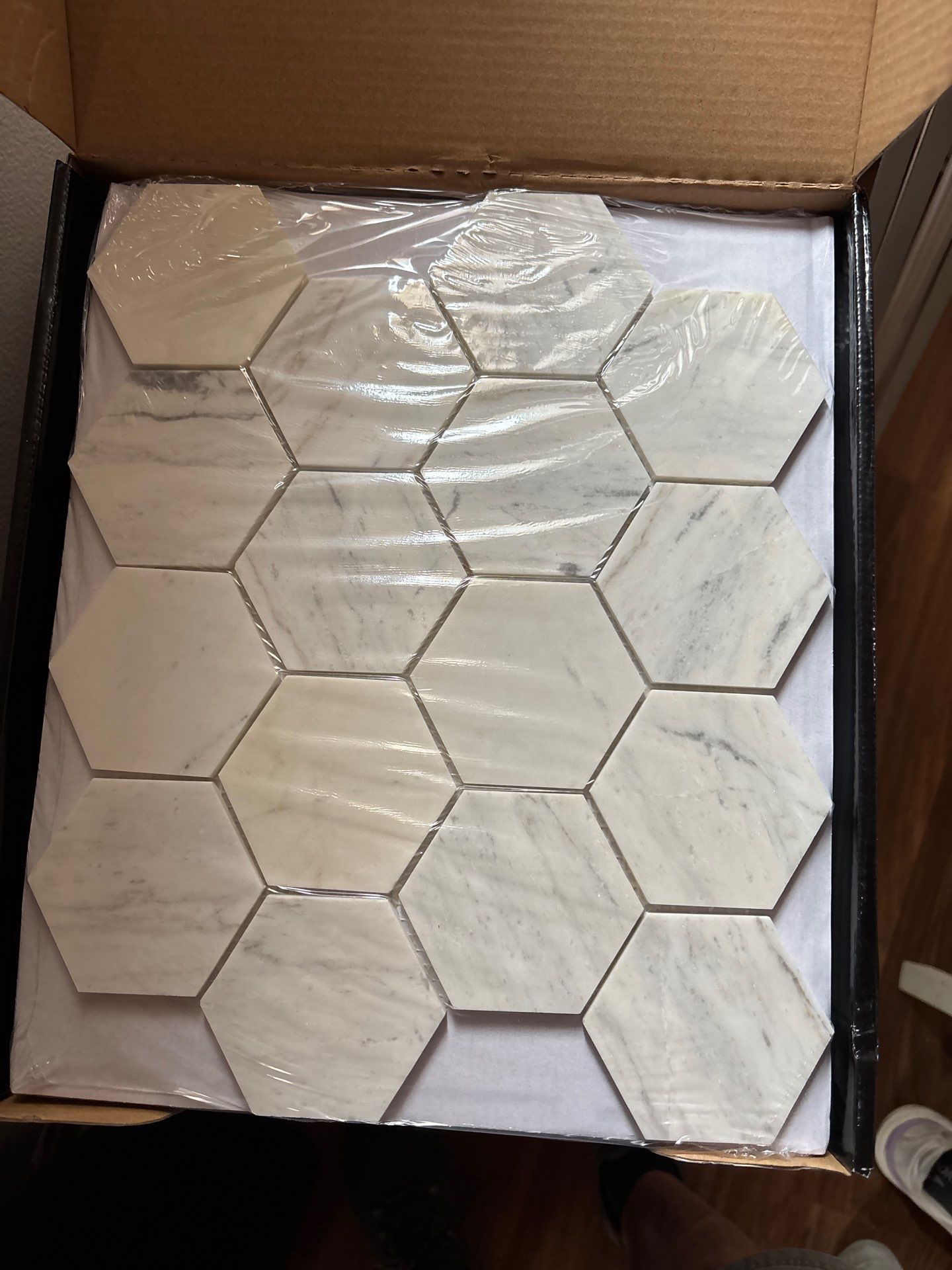 Custom Bathroom Remodel and Marble Tile Installation in Bellevue by Footprints Floors Kentucky