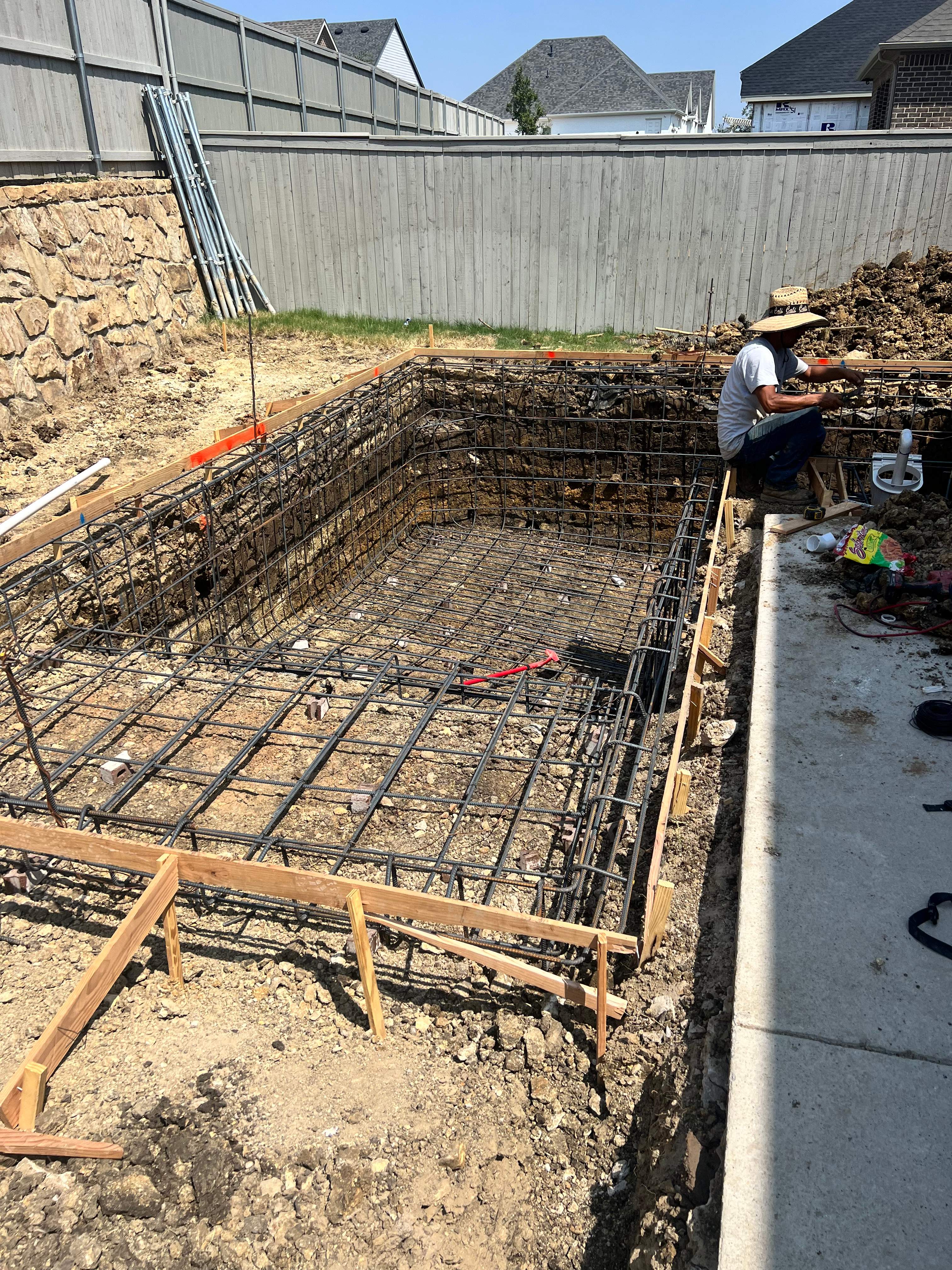 Geometric Pool with Raised Spa and Dusk Lighting by Pinnacle Pools and Spas - DFW