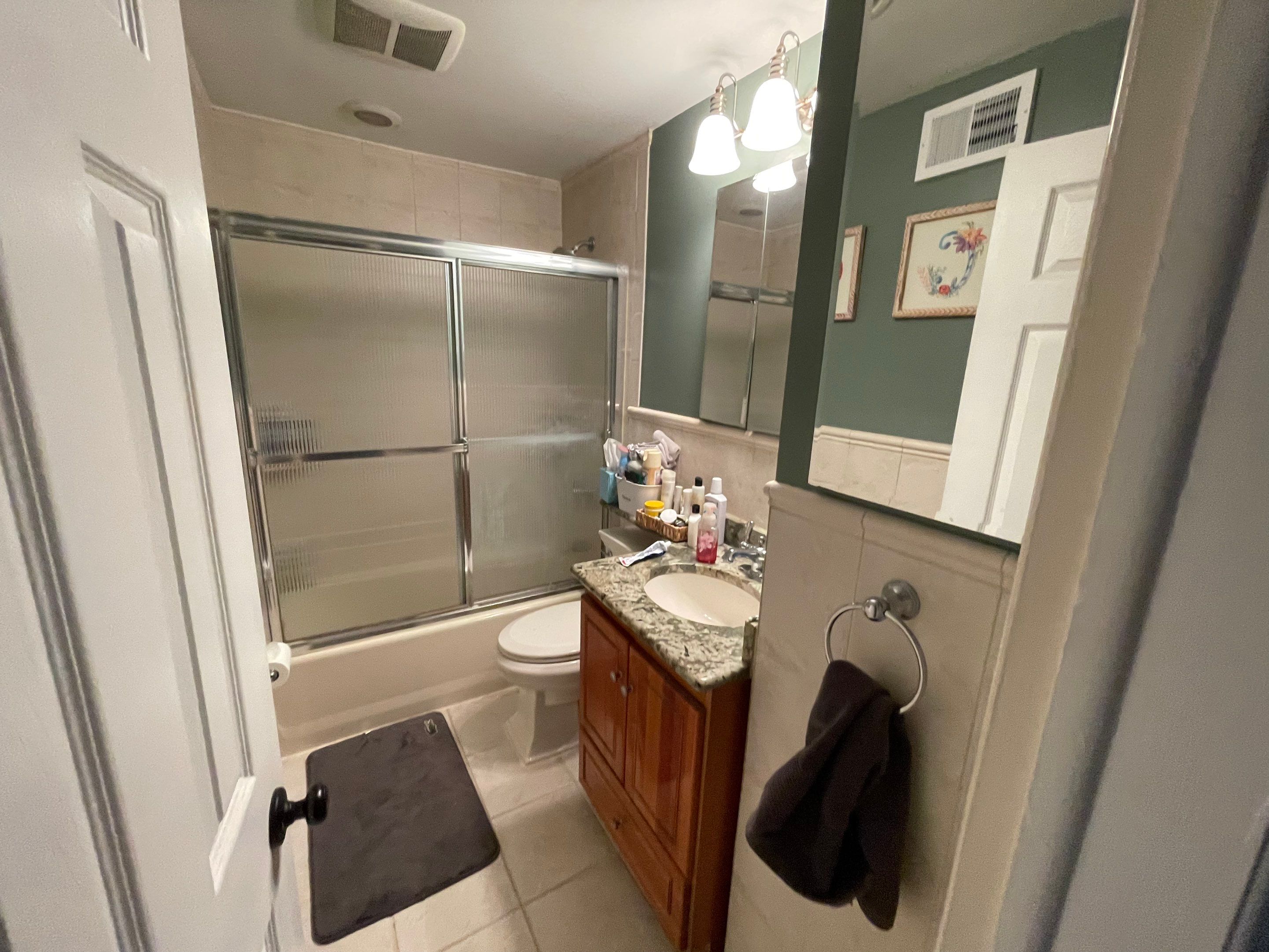 Bathroom Remodel using Cabinets by Home Concepts Construction