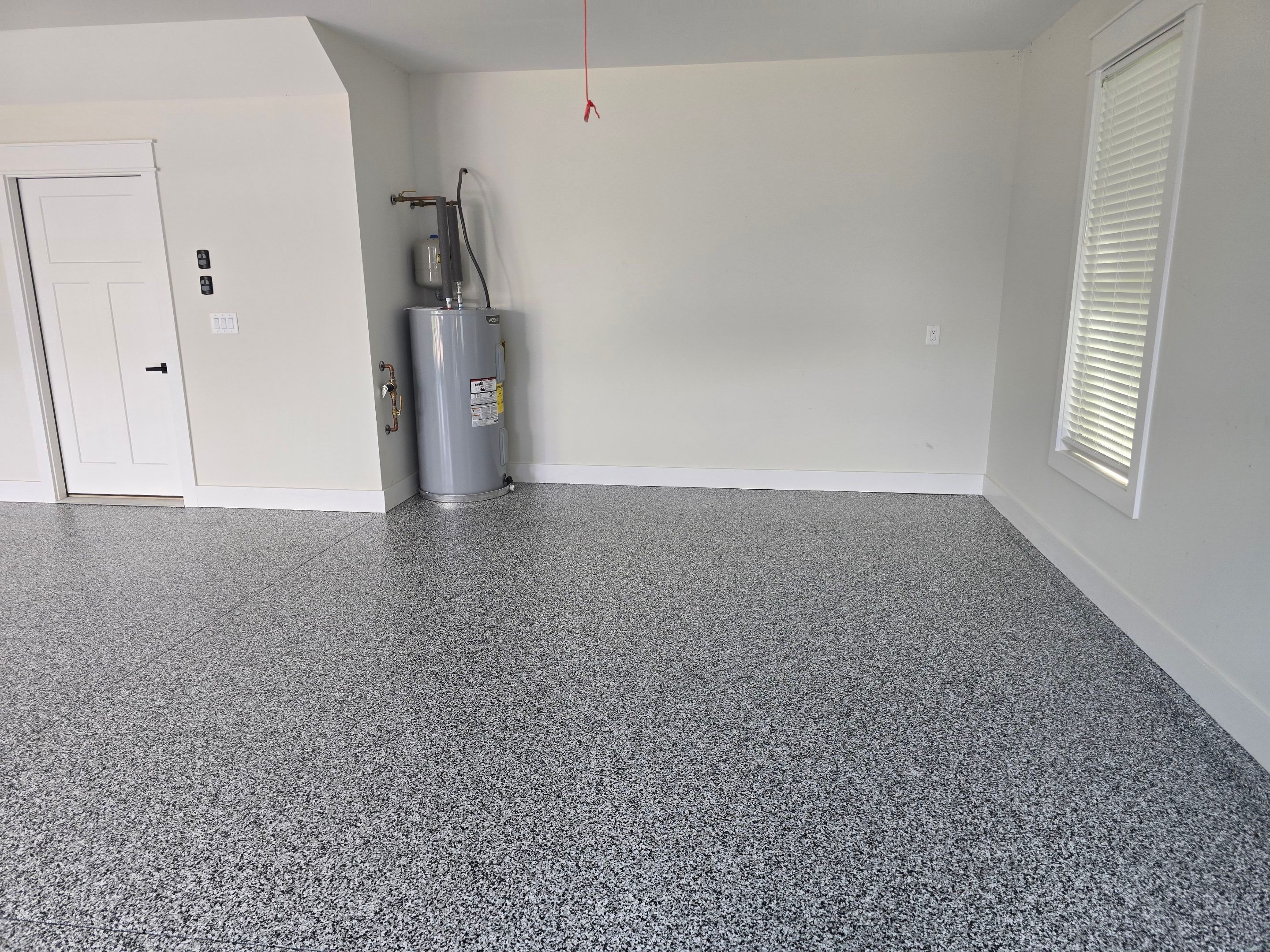 Garage using Domino by Elite Floor Solutions