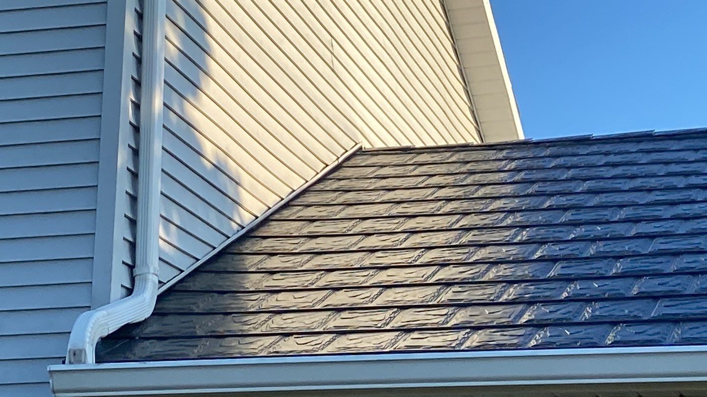 Residential Roofing Installation using Metstar Slate Plus Smooth Black by Nitro Roofing and Construction