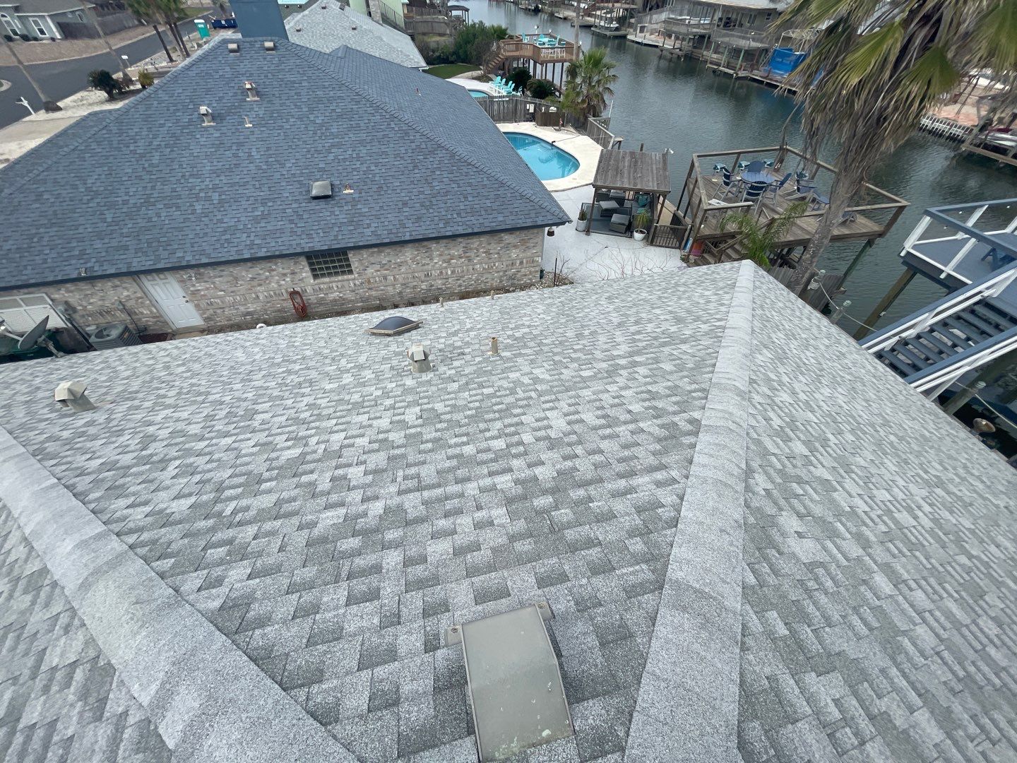 Residential Roofing Repair using Galvanized Chimney Cap & Chase by Lighthouse Roofing