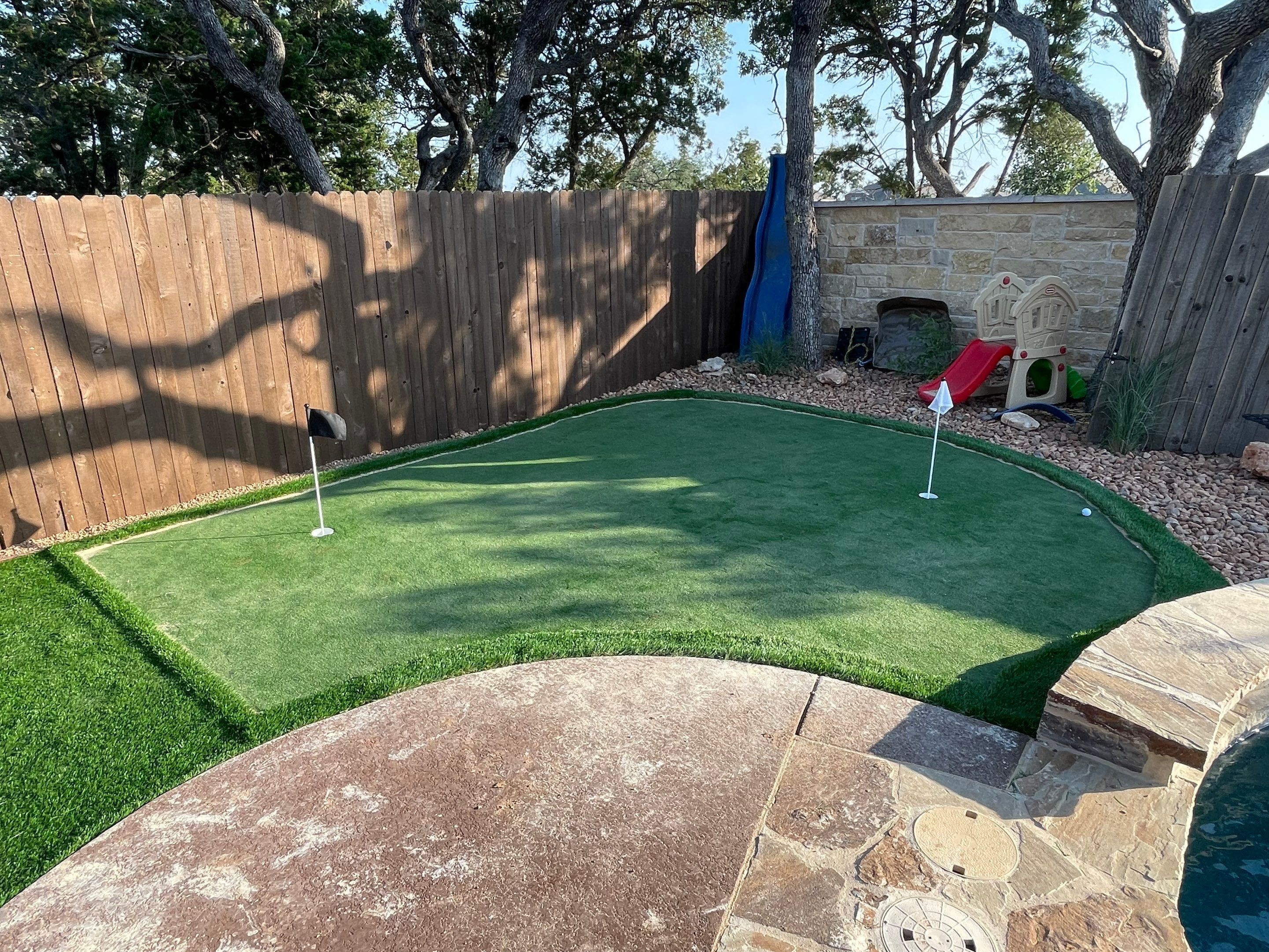 Turf Play Area around Pool by Singer Services